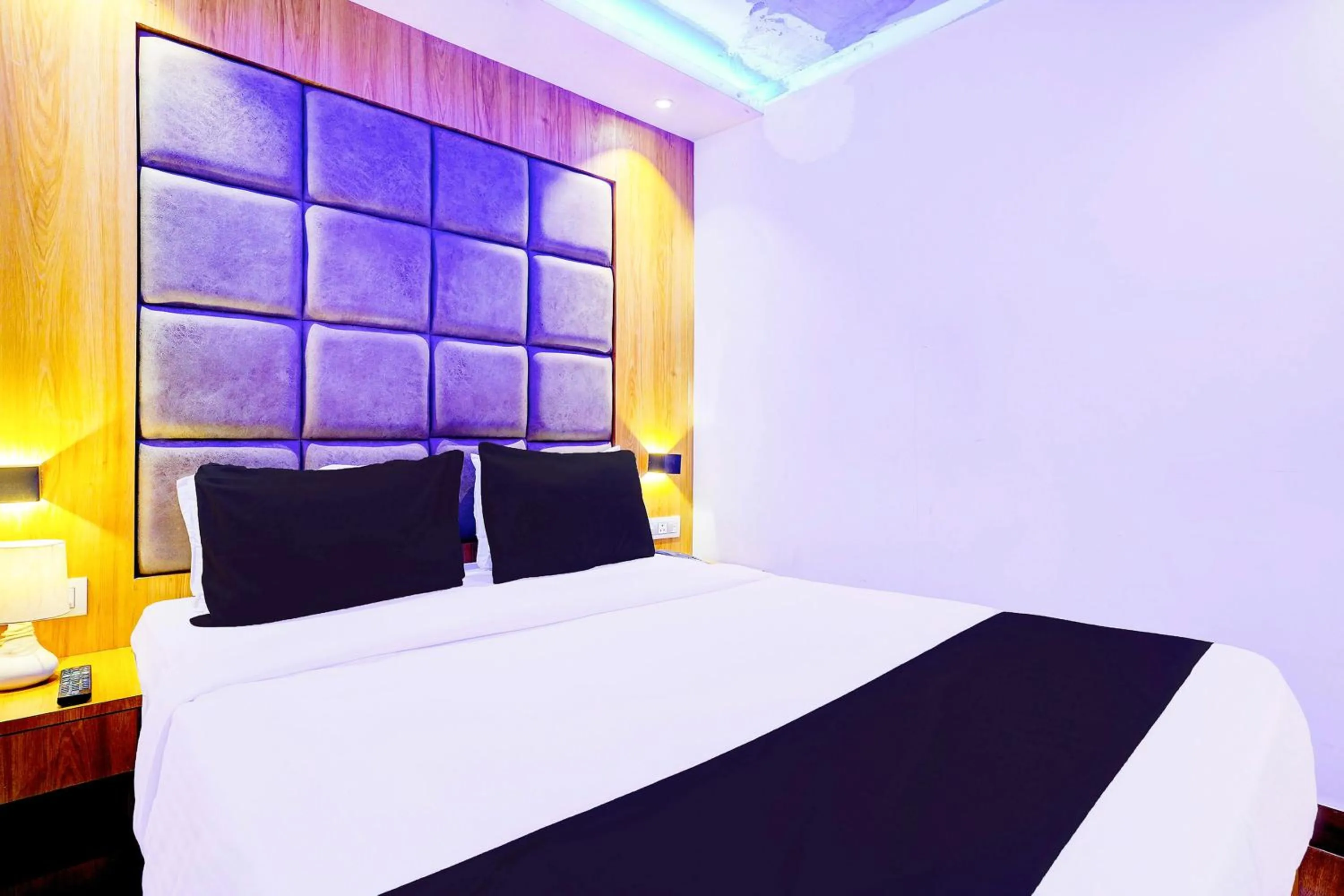 Bedroom in Hotel O Sakinaka Andheri Kurla Road