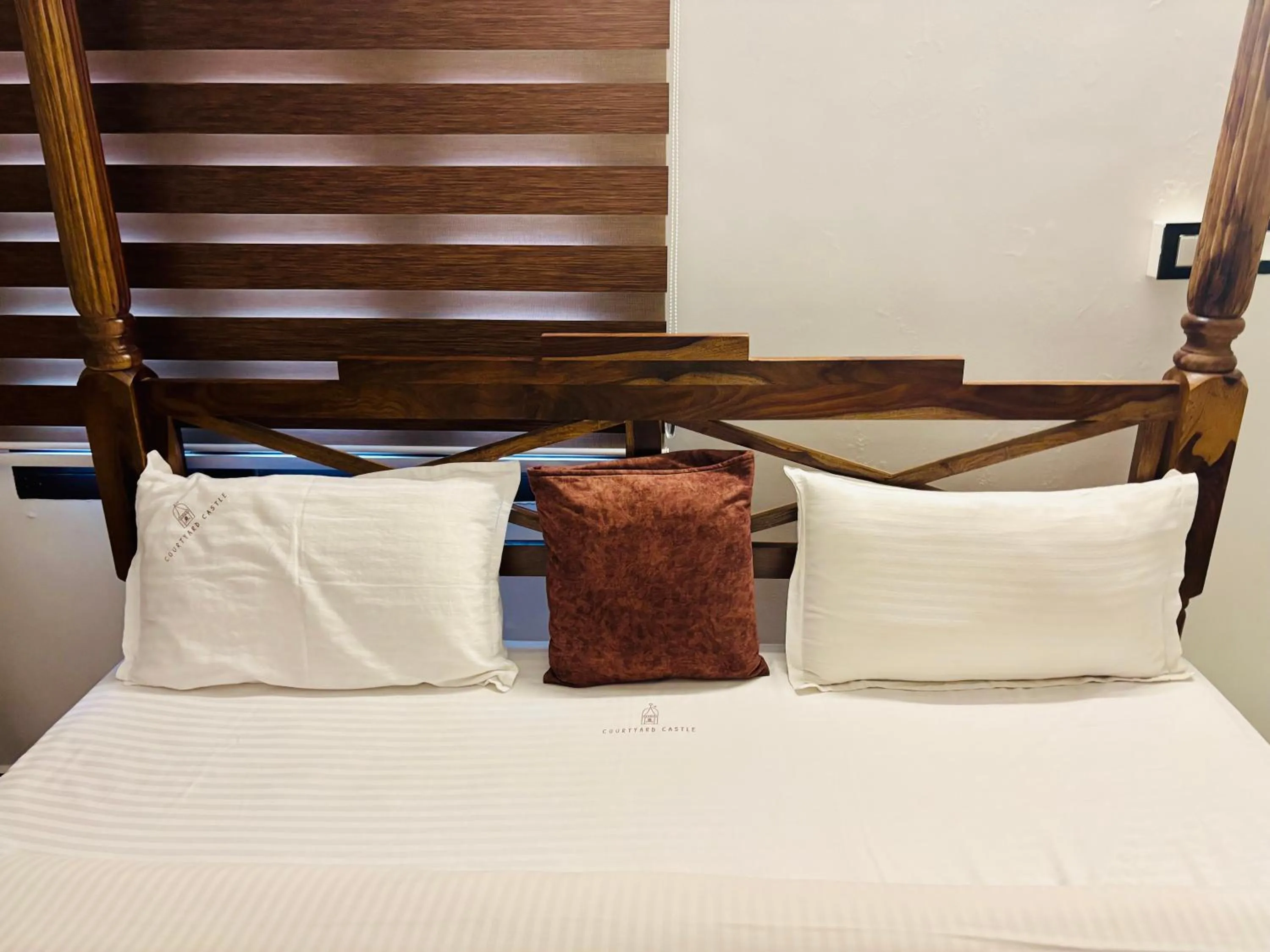 Bed in Courtyard Castle Heritage Resort