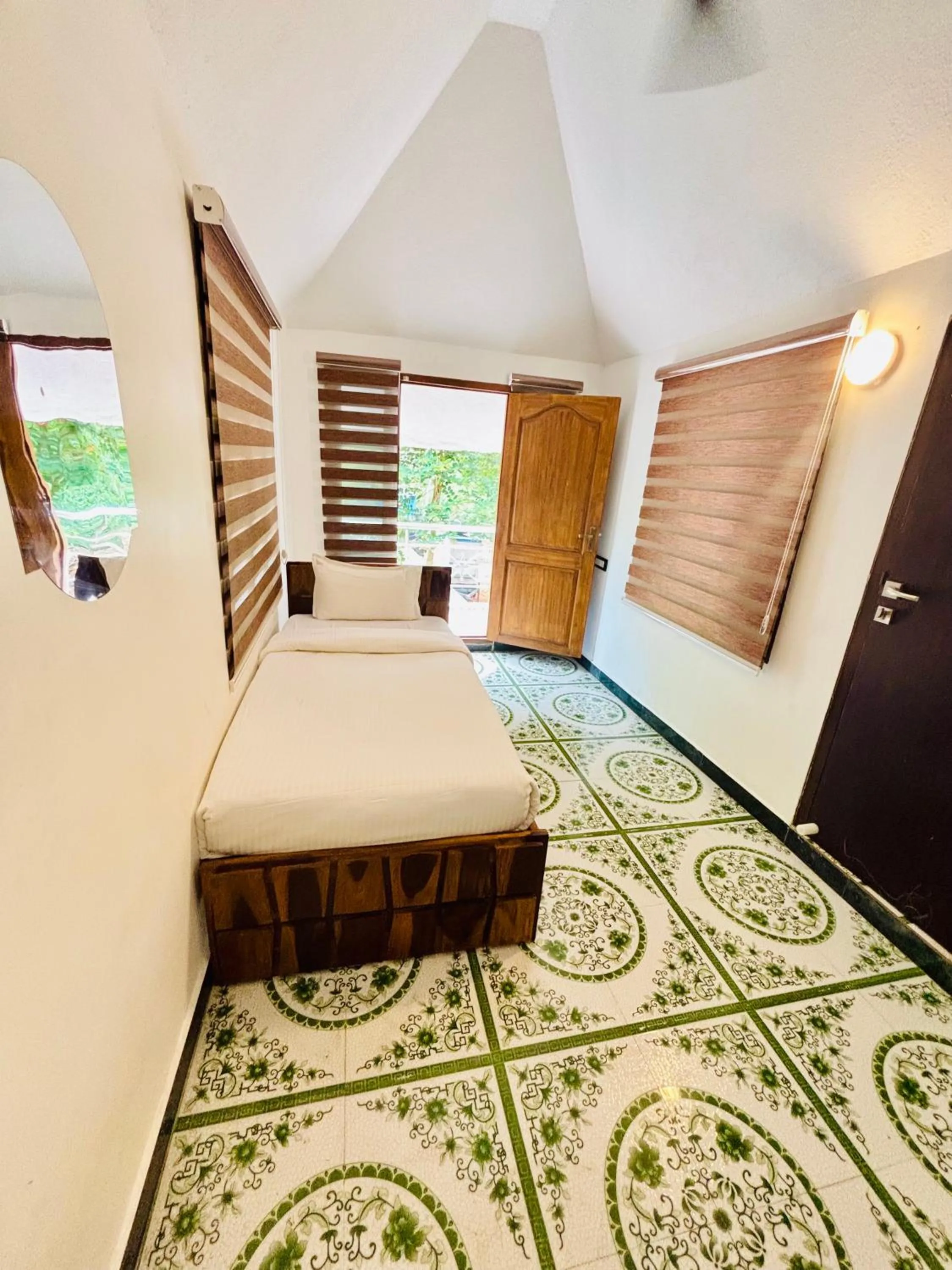 Bed in Courtyard Castle Heritage Resort