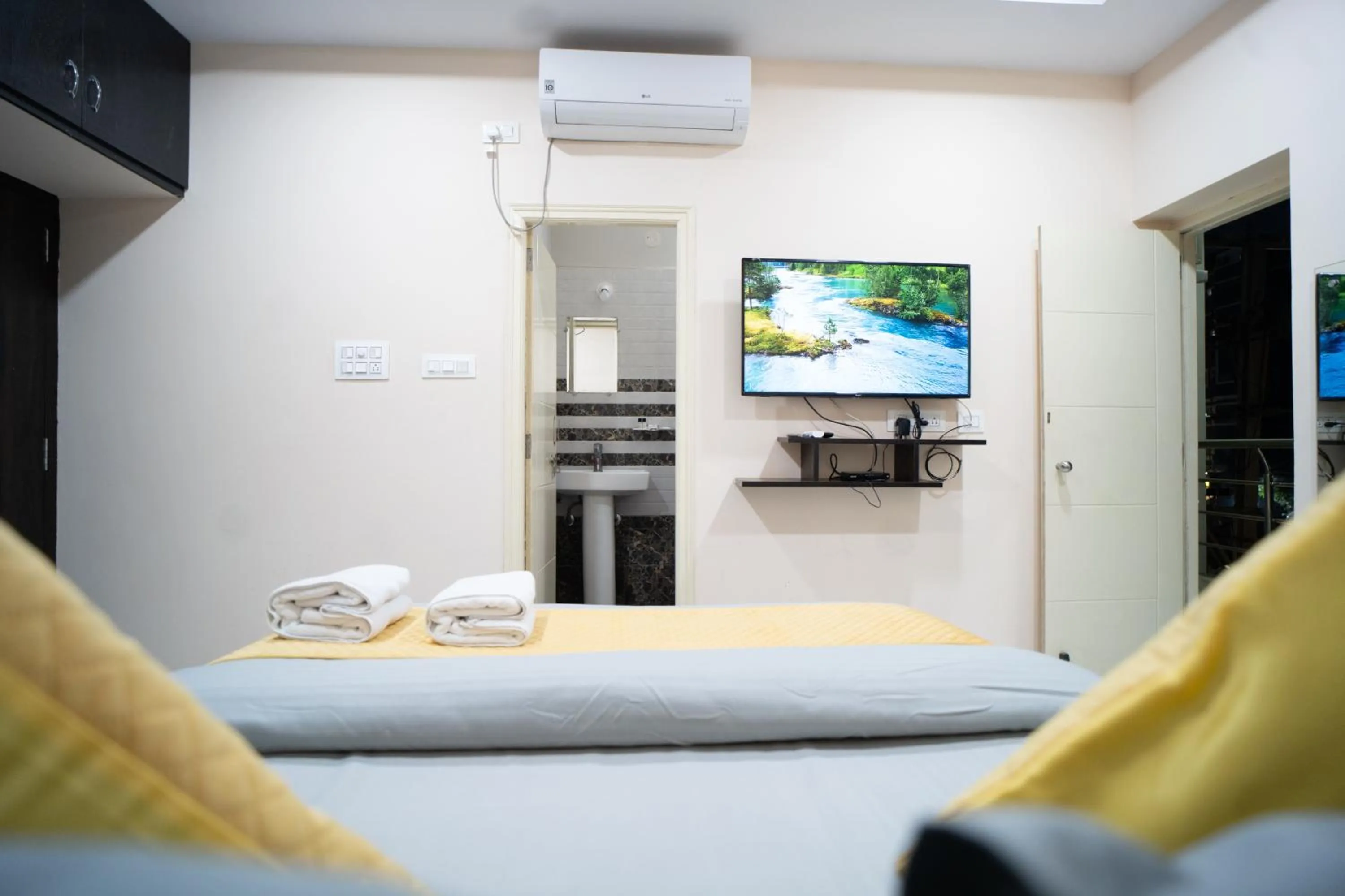 Bed in Yellow Bells Gachibowli