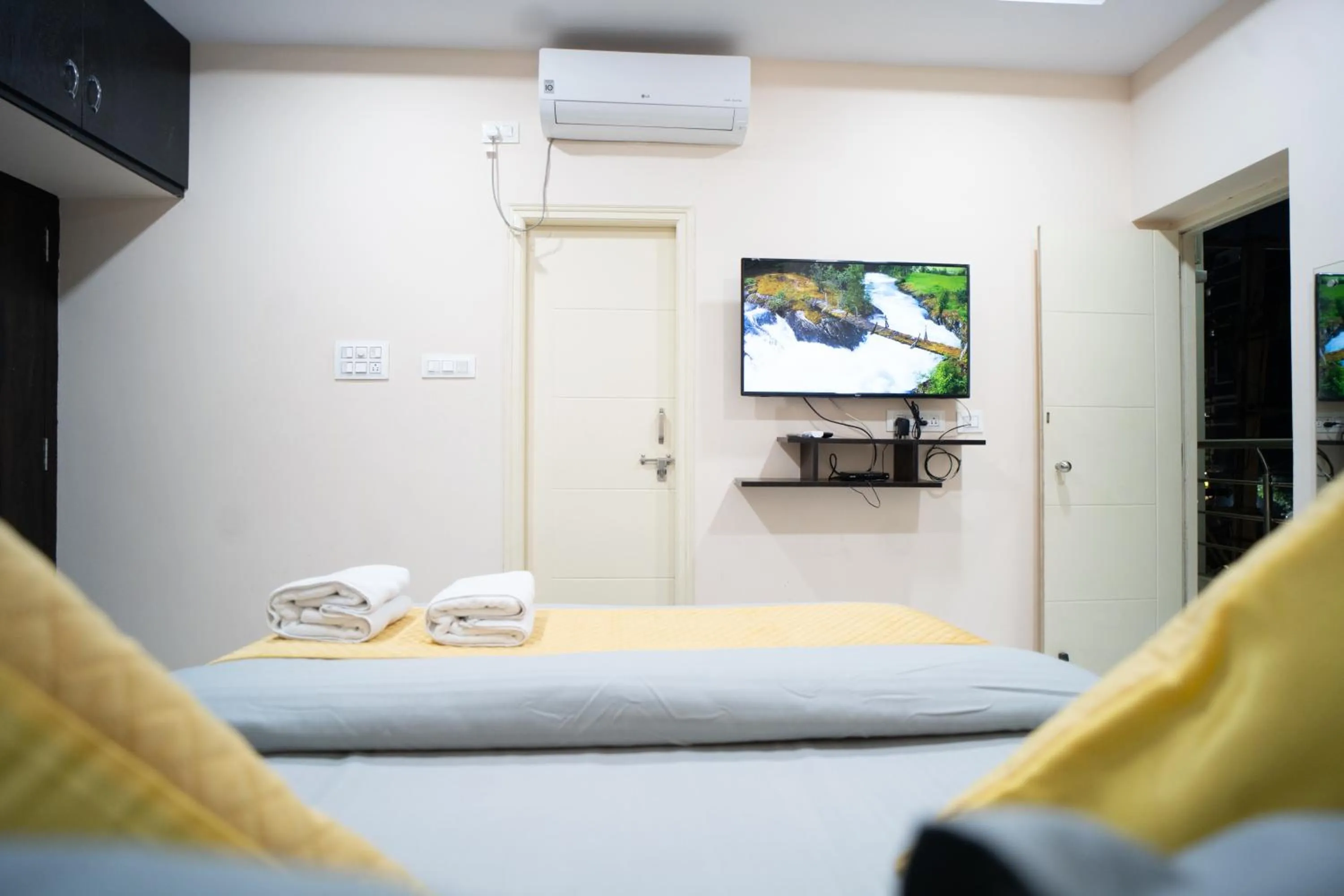 Bed in Yellow Bells Gachibowli