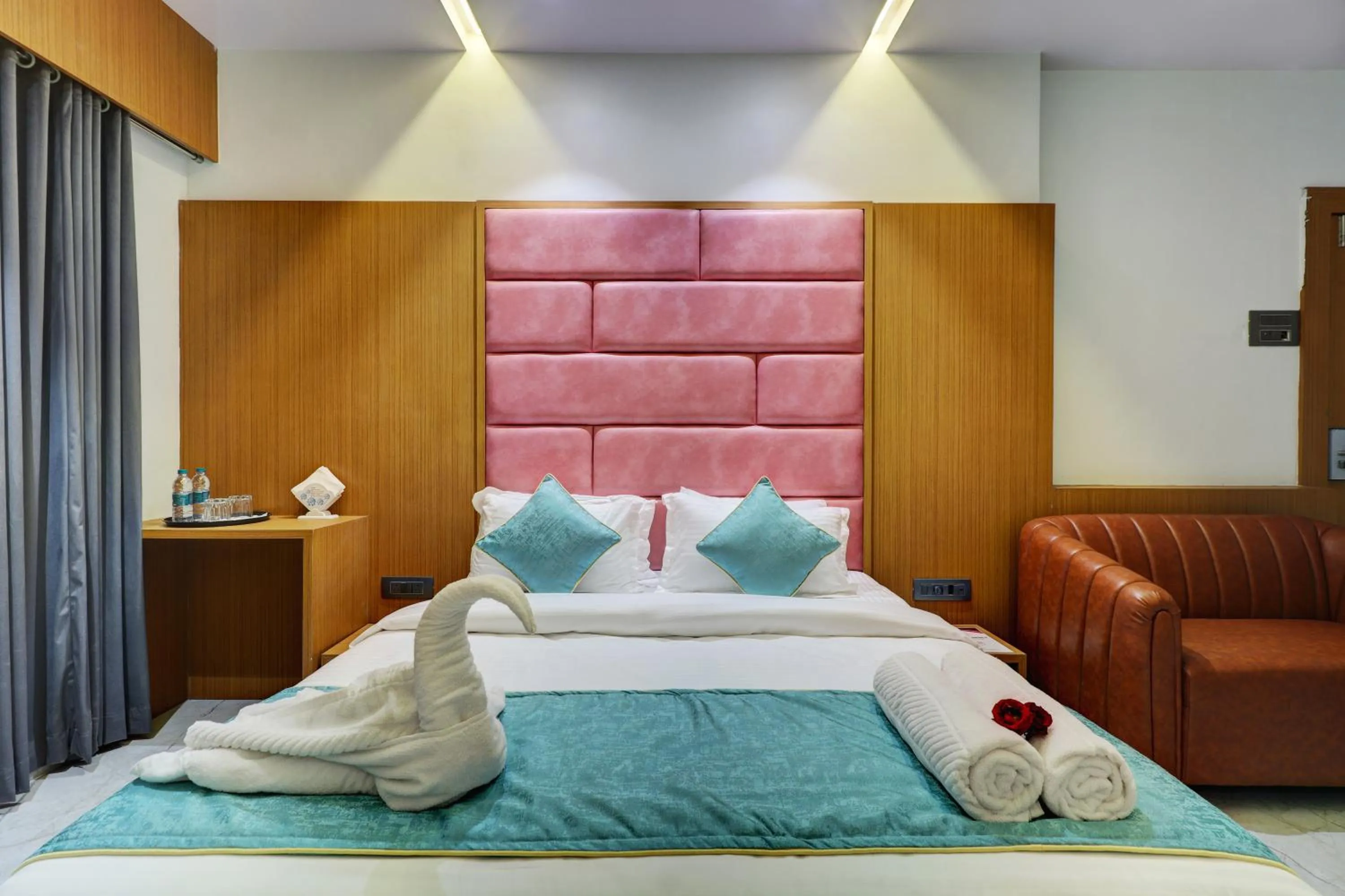 Living room, Bed in Radhe Residency