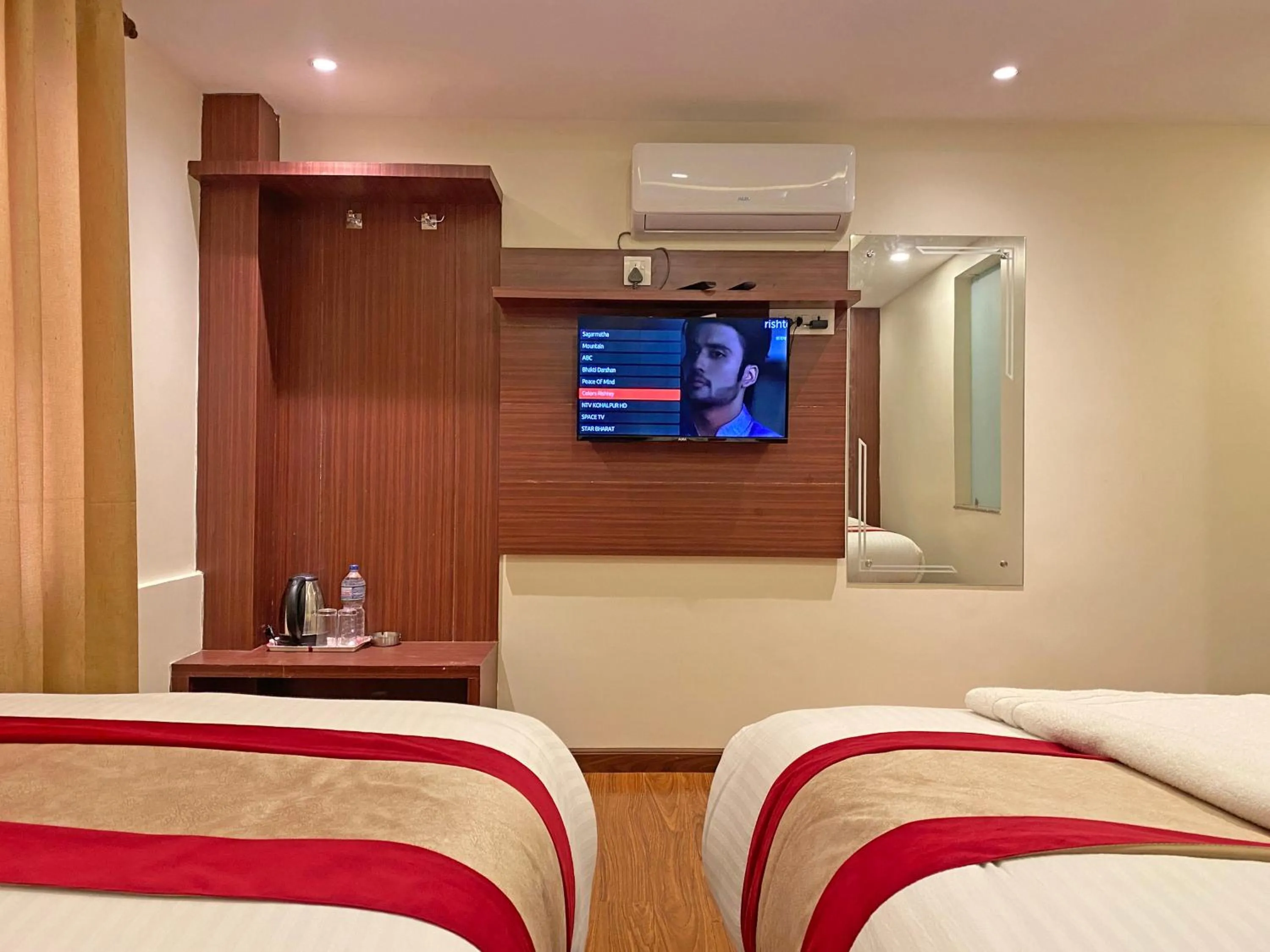 Communal lounge/ TV room, Bed in Hotel Dipjyoti