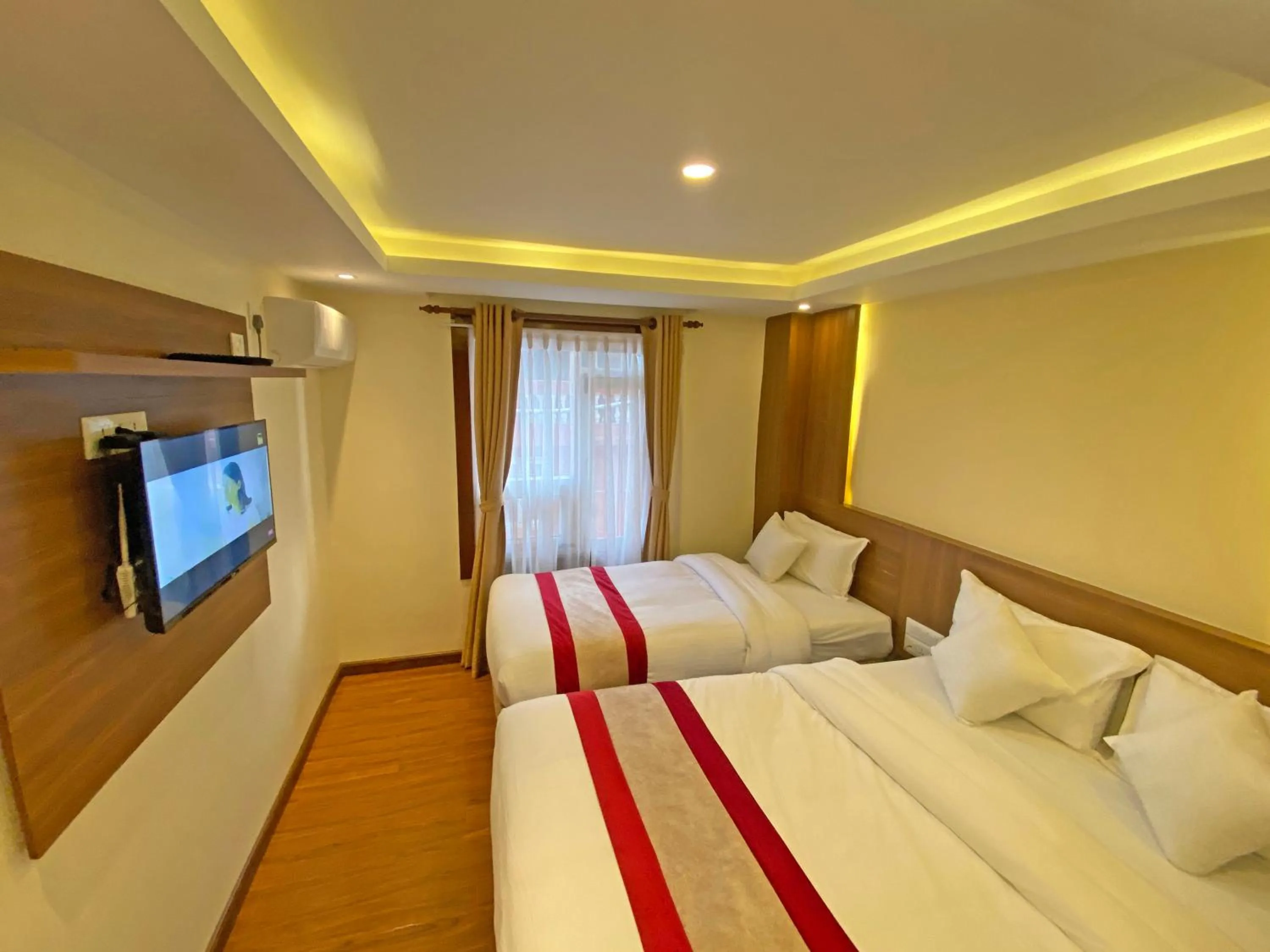 Communal lounge/ TV room, Bed in Hotel Dipjyoti