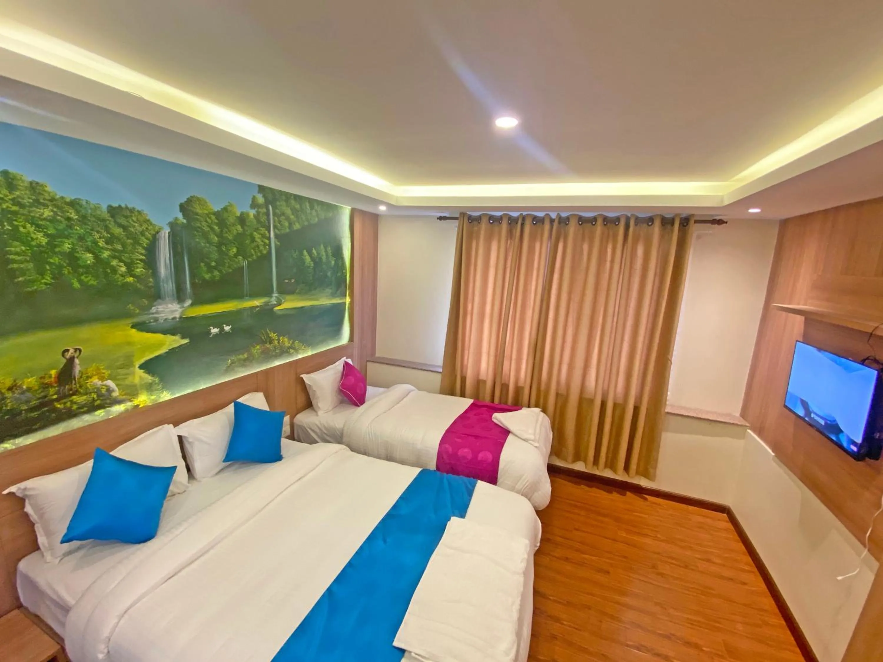 Communal lounge/ TV room, Bed in Hotel Dipjyoti