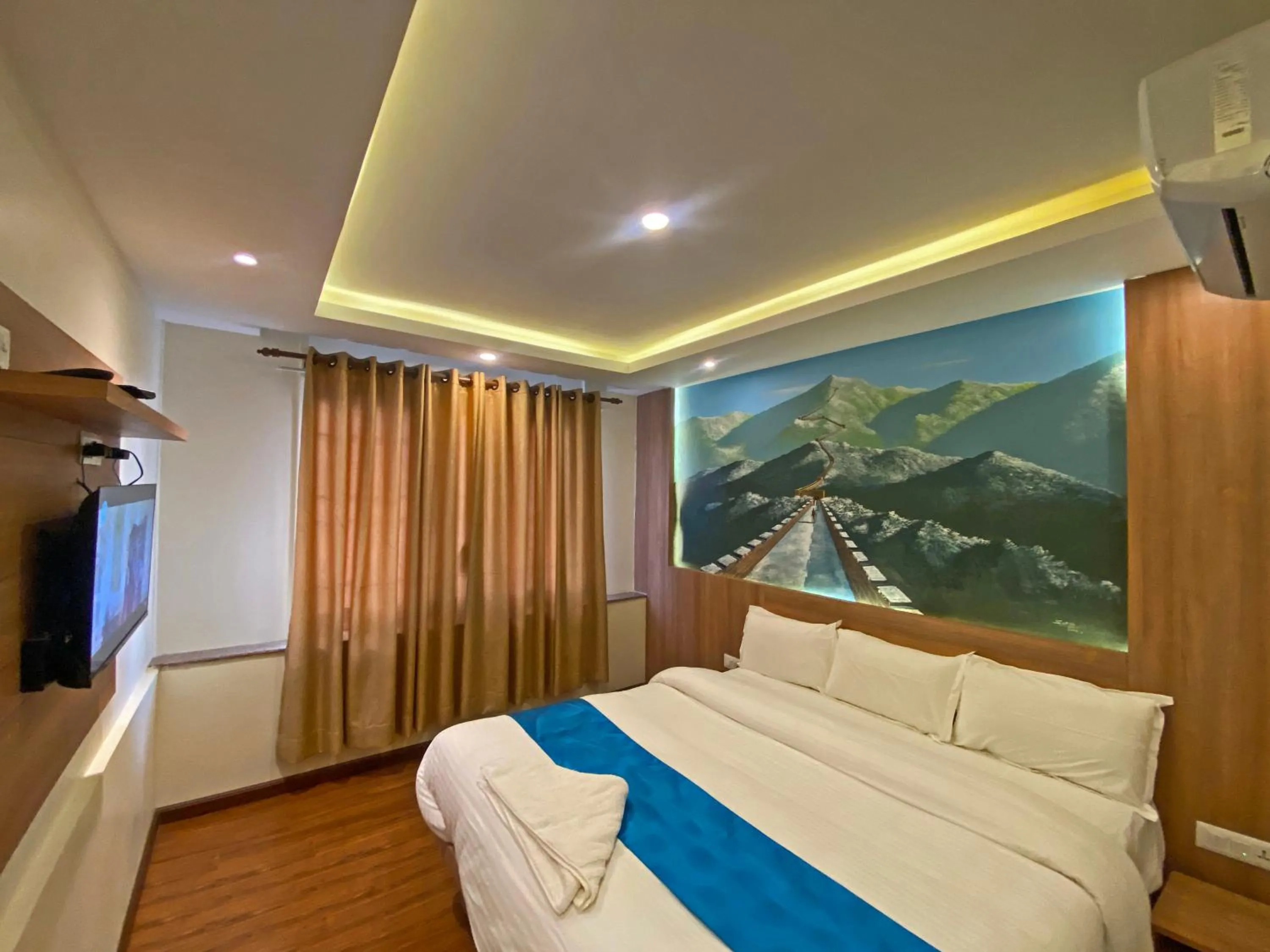 Communal lounge/ TV room, Bed in Hotel Dipjyoti