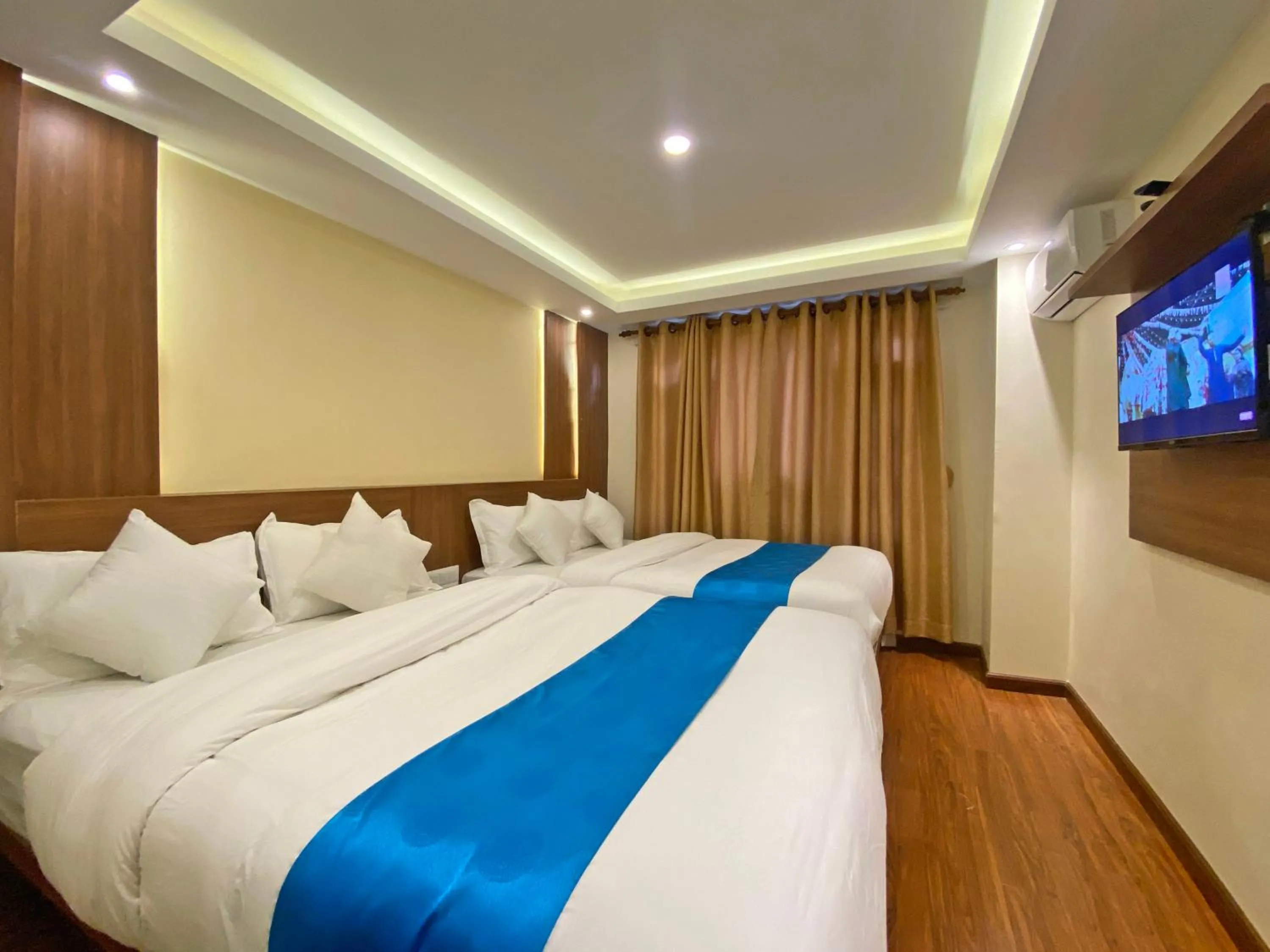 Communal lounge/ TV room, Bed in Hotel Dipjyoti