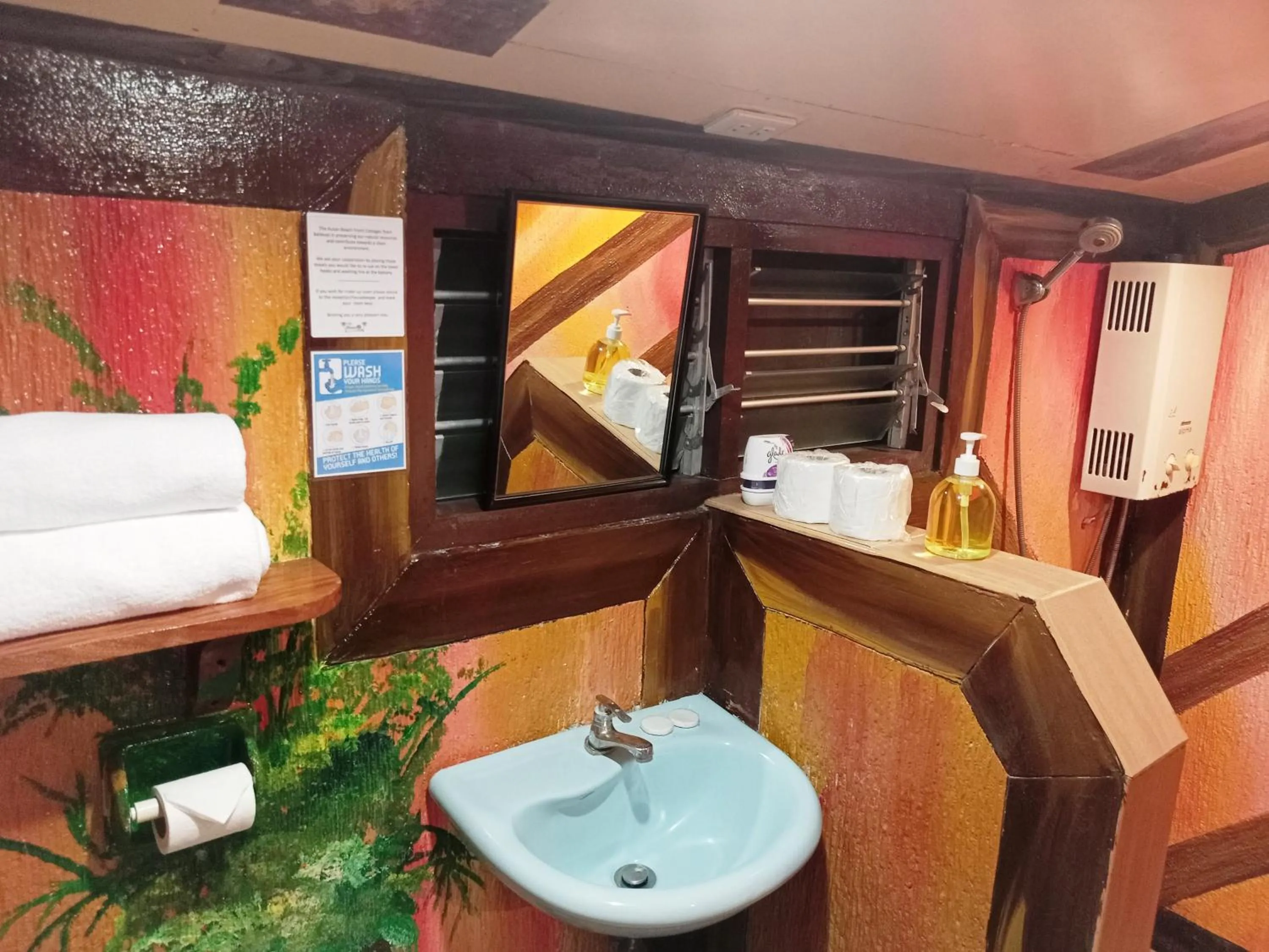 Toilet, Bed in Ausan Beach Front Cottages