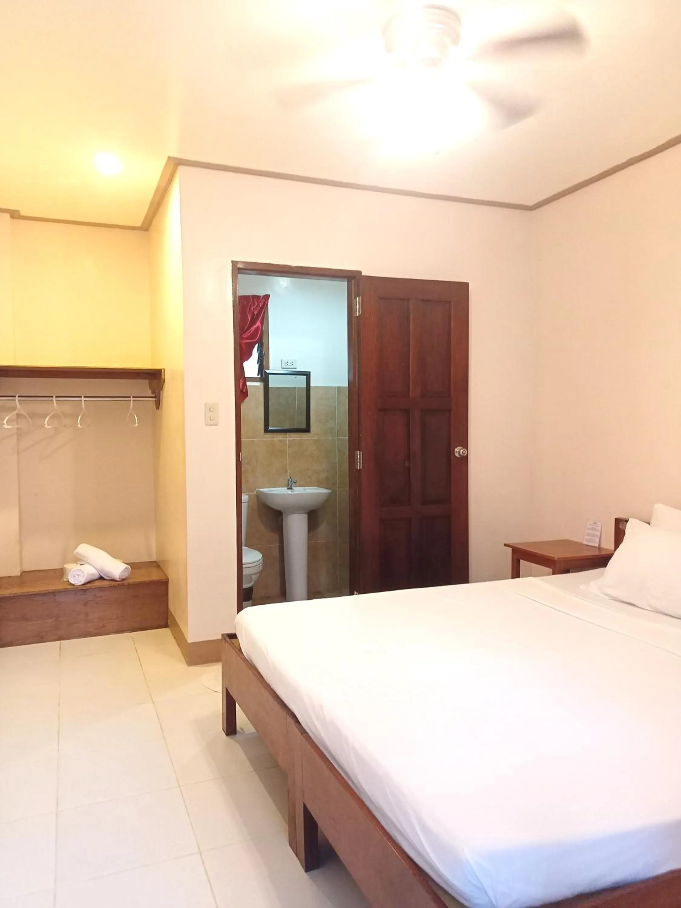 Toilet, Bed in Ausan Beach Front Cottages