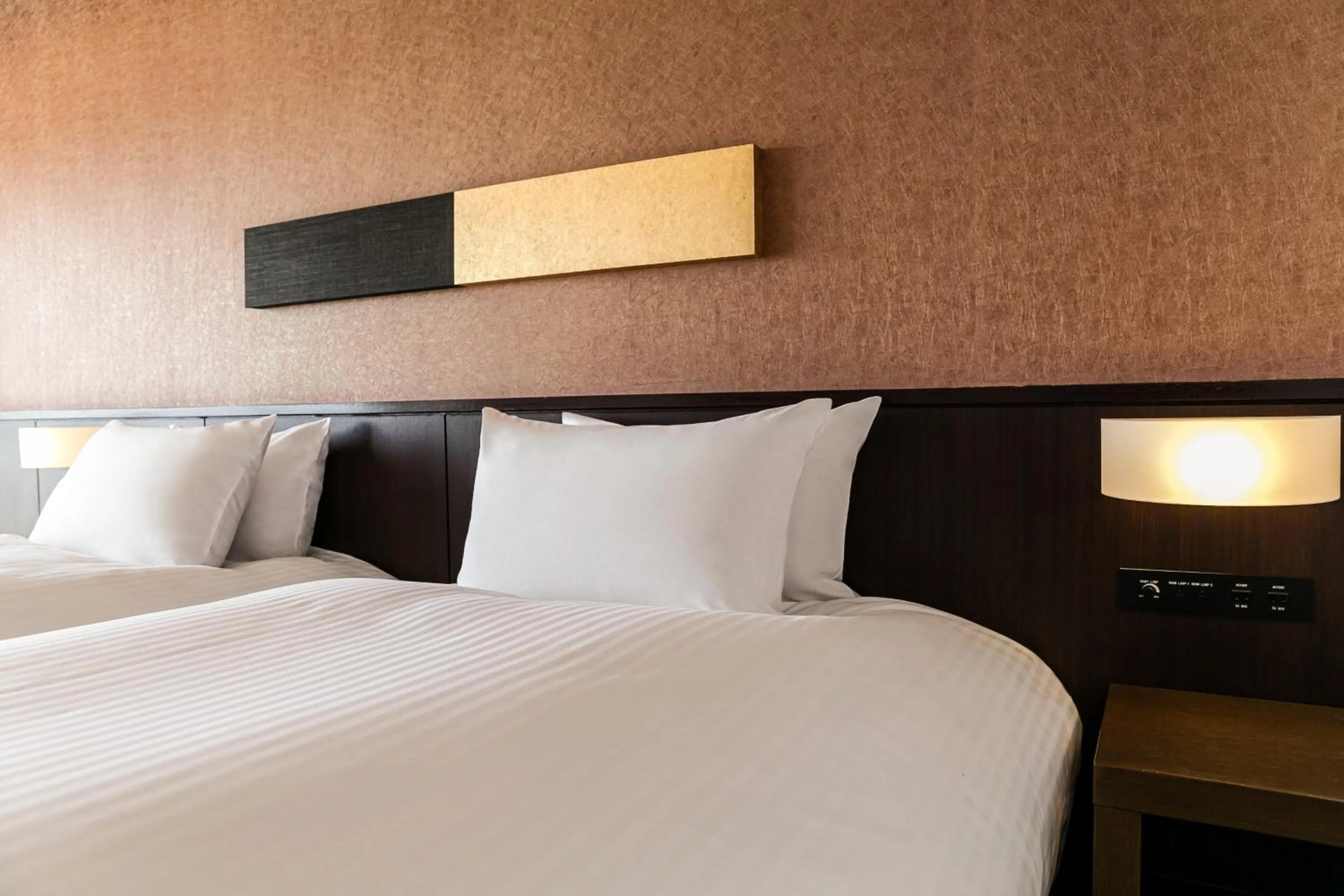 Bed in Grand Mercure Okinawa Cape Zanpa Resort