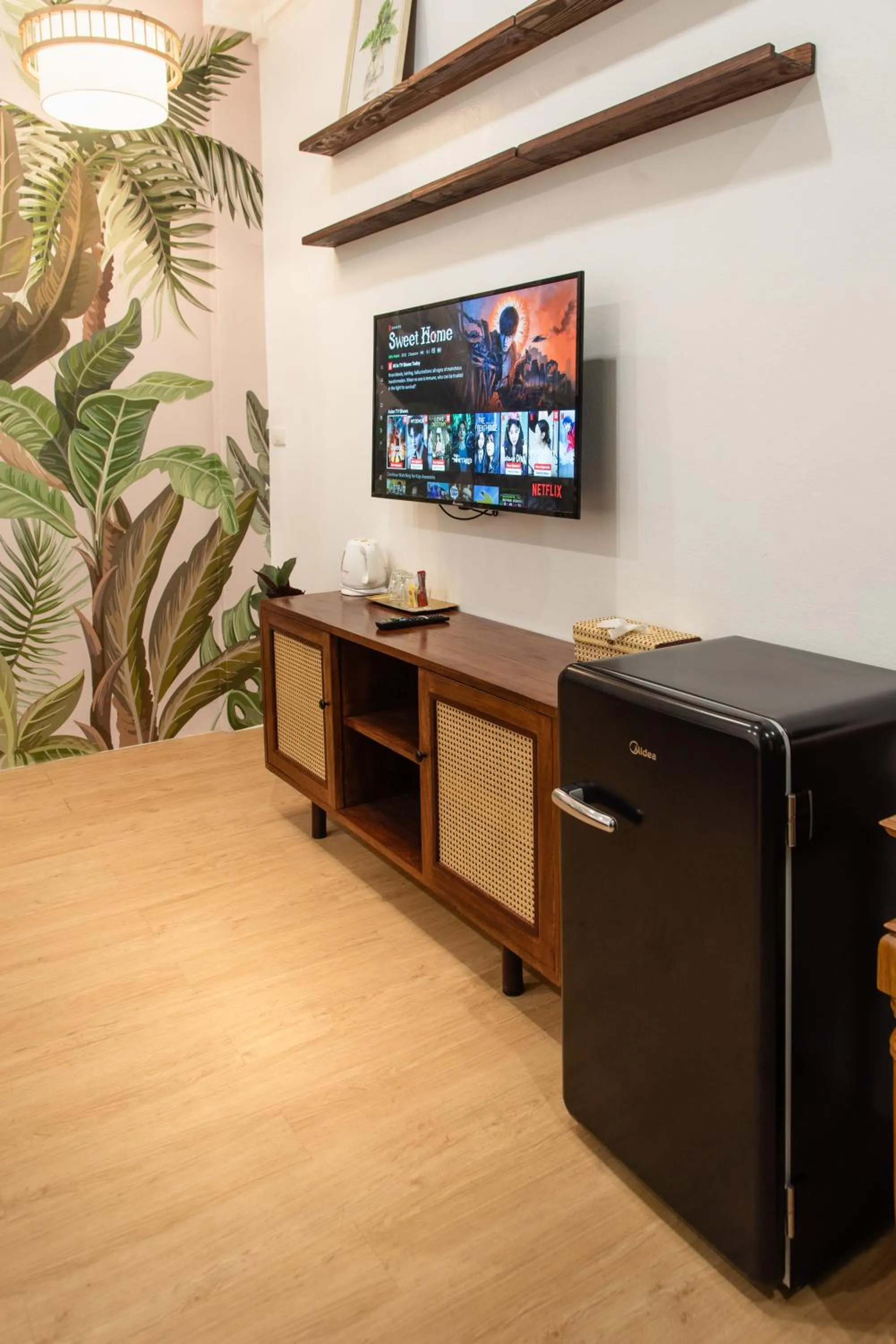 Communal lounge/ TV room in Bania Boutique House