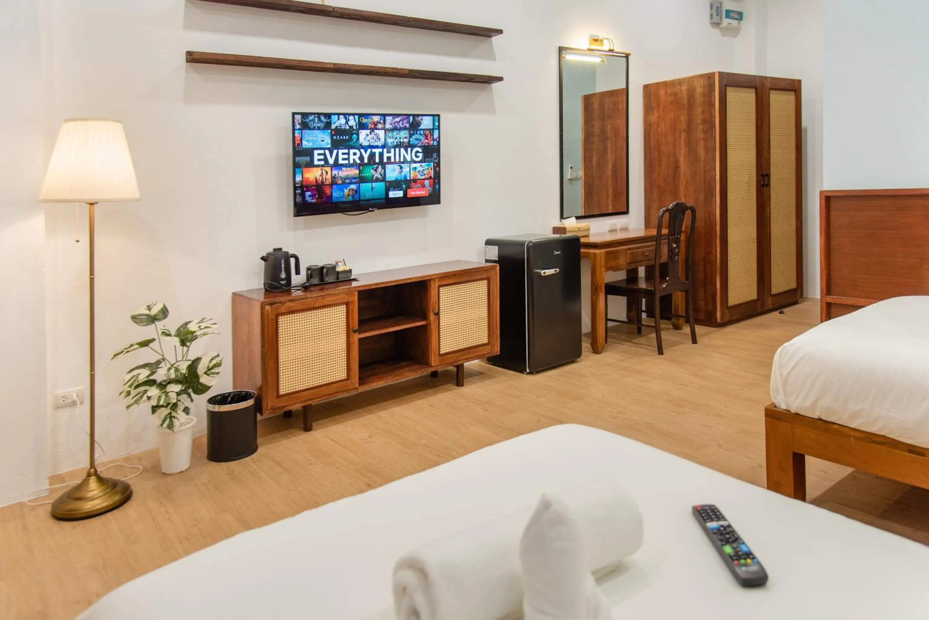 Communal lounge/ TV room, Bed in Bania Boutique House