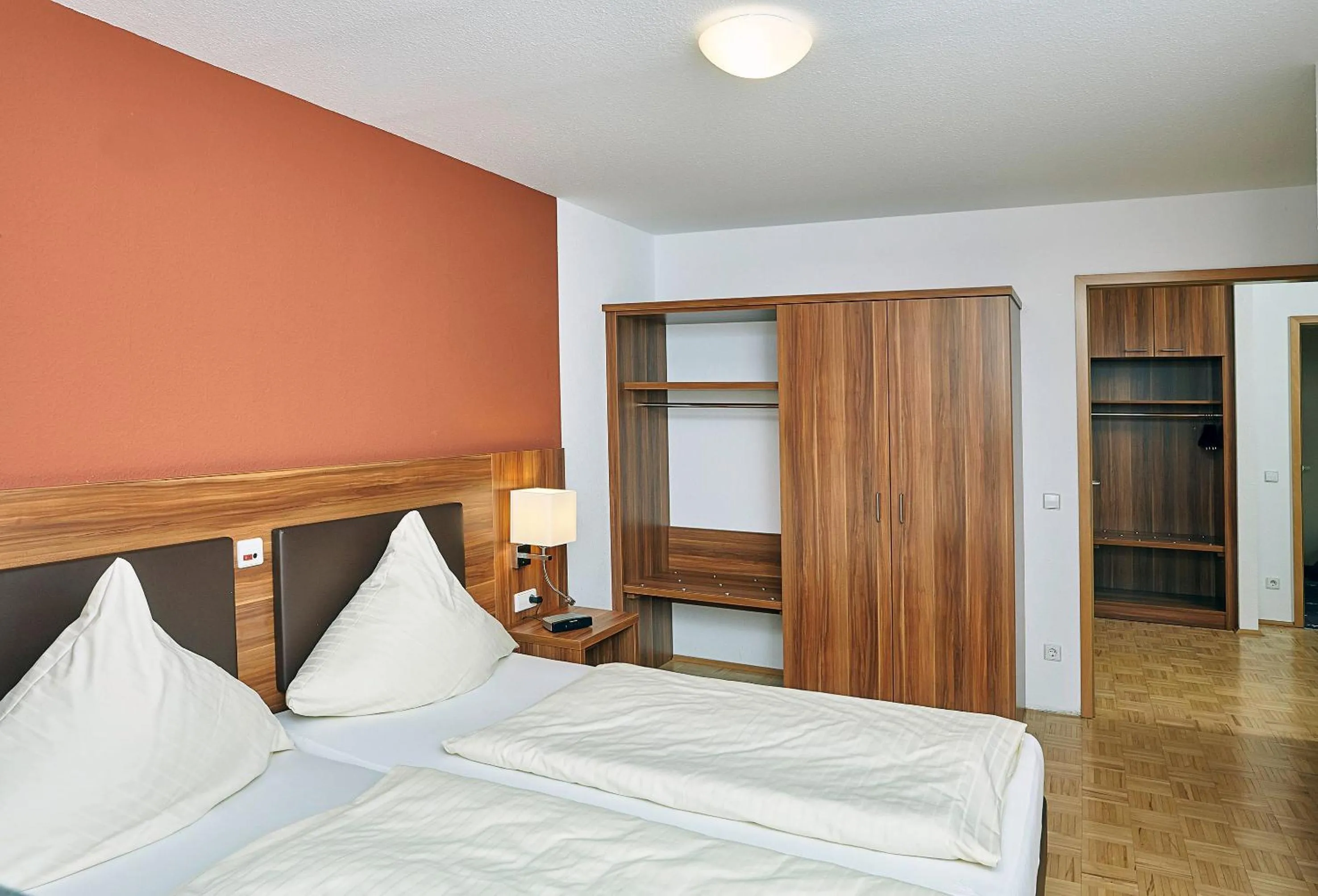 Bedroom, Bed in Hotel & Residenz Am Kurpark