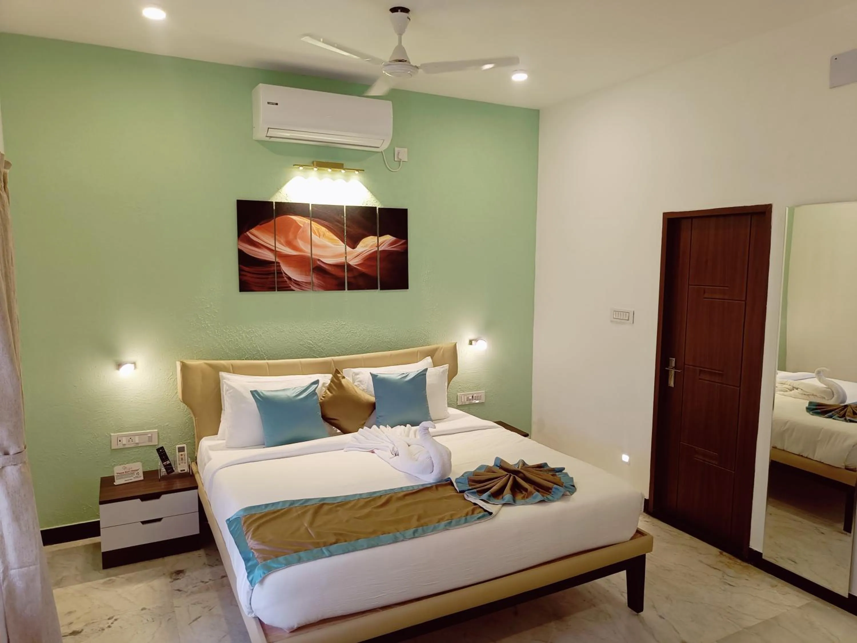 Bed in Bay Breeze Suites