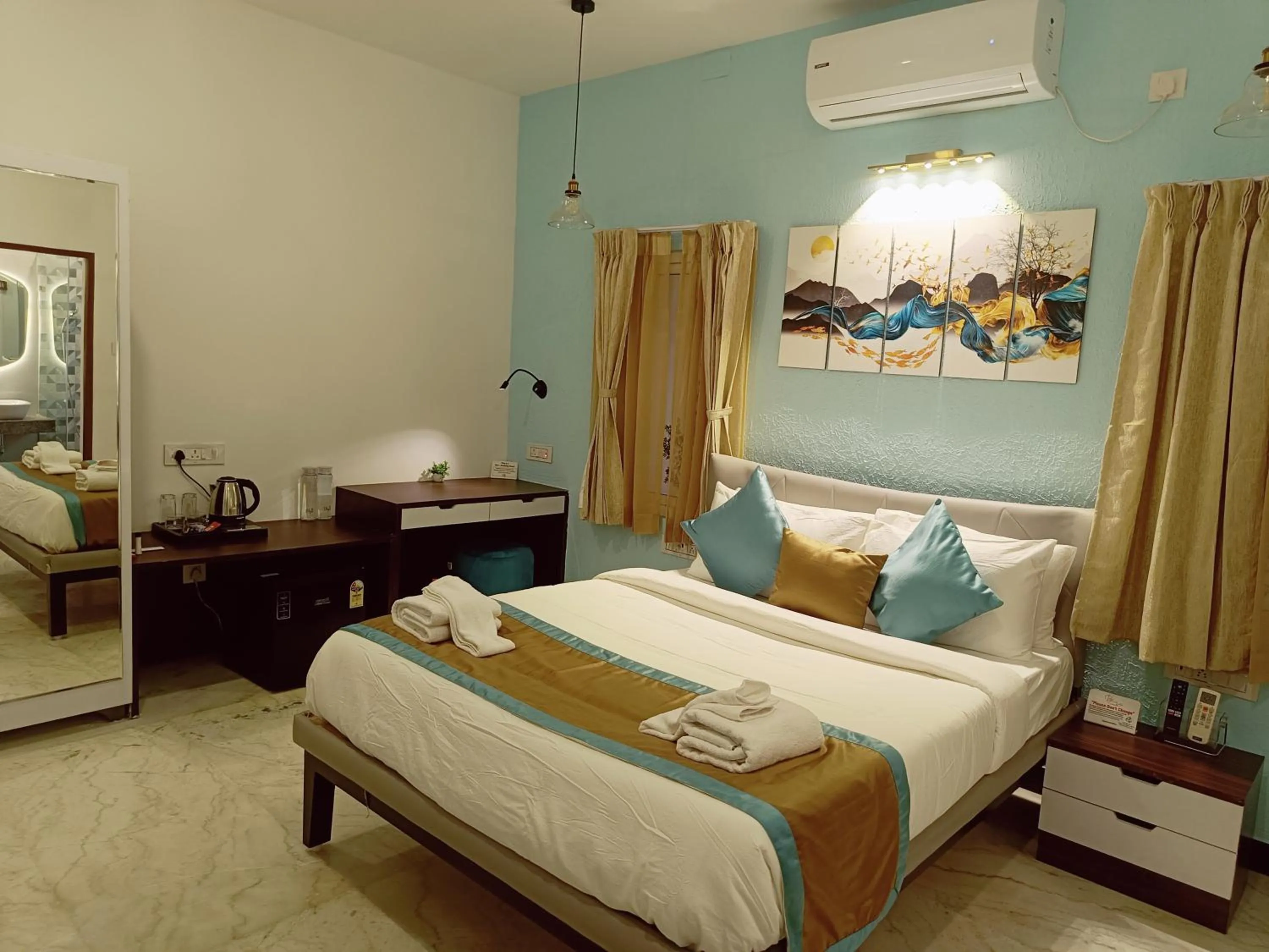 Bed in Bay Breeze Suites