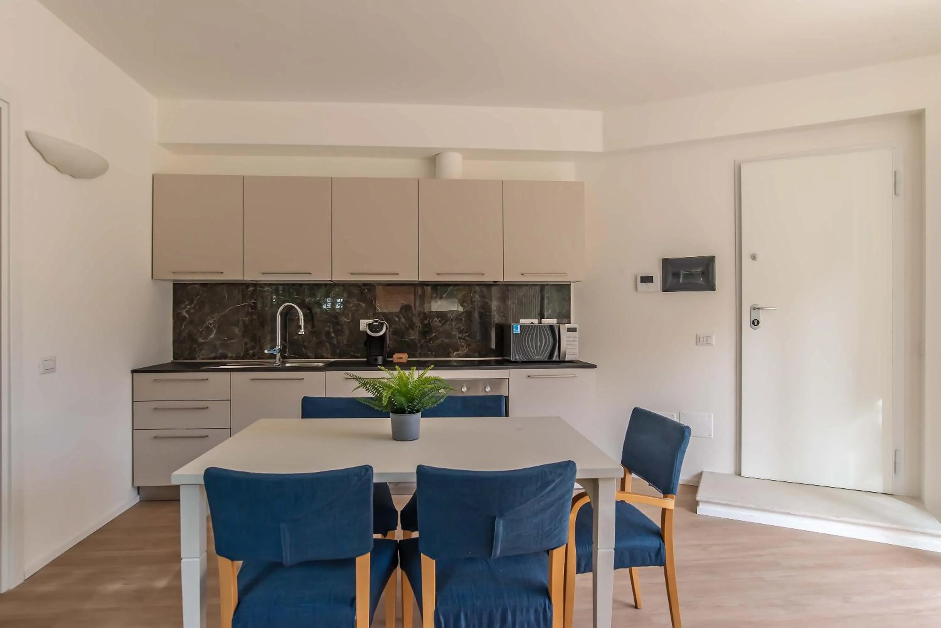 Kitchen or kitchenette in Appartamenti Tre Fontane