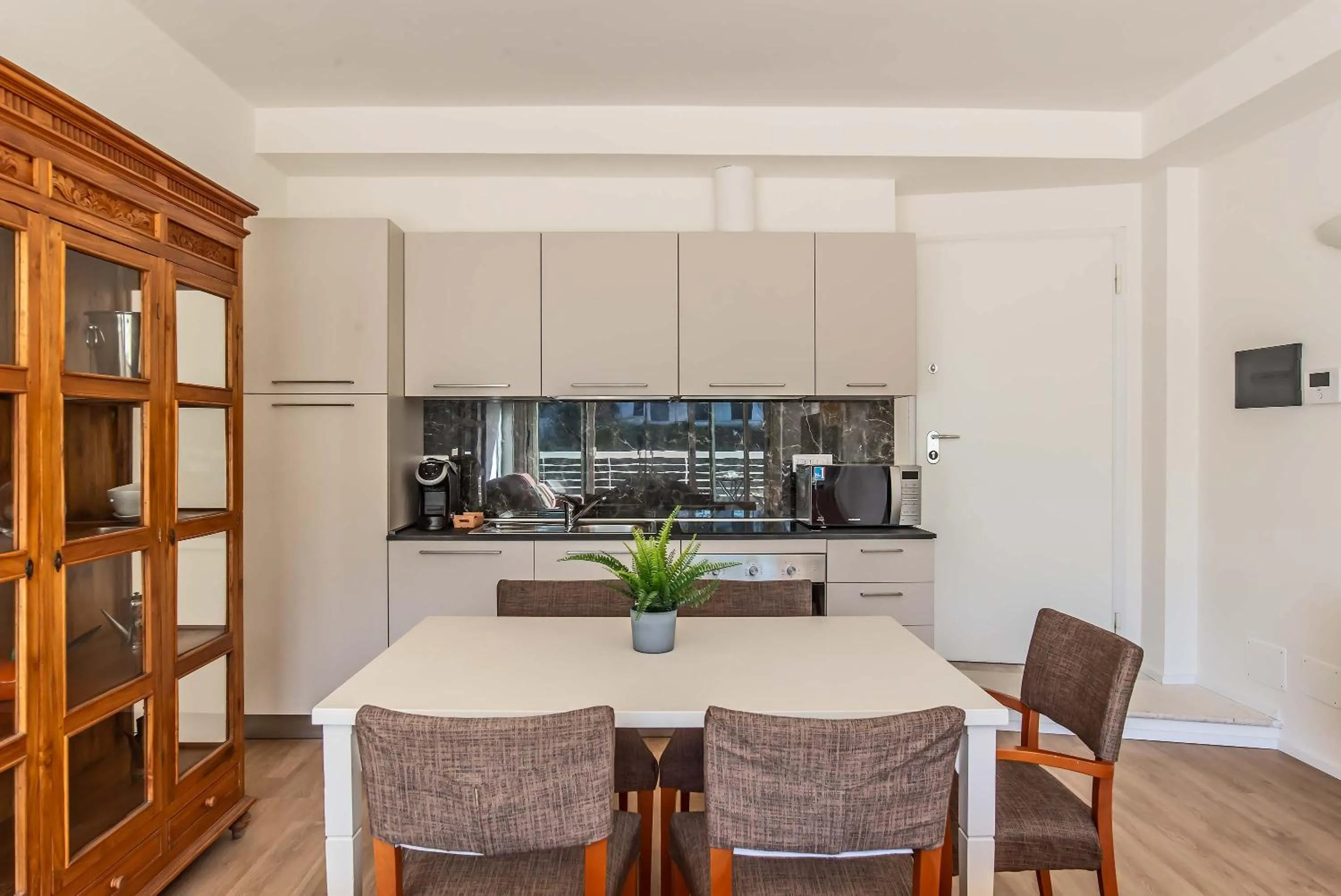 Kitchen or kitchenette in Appartamenti Tre Fontane