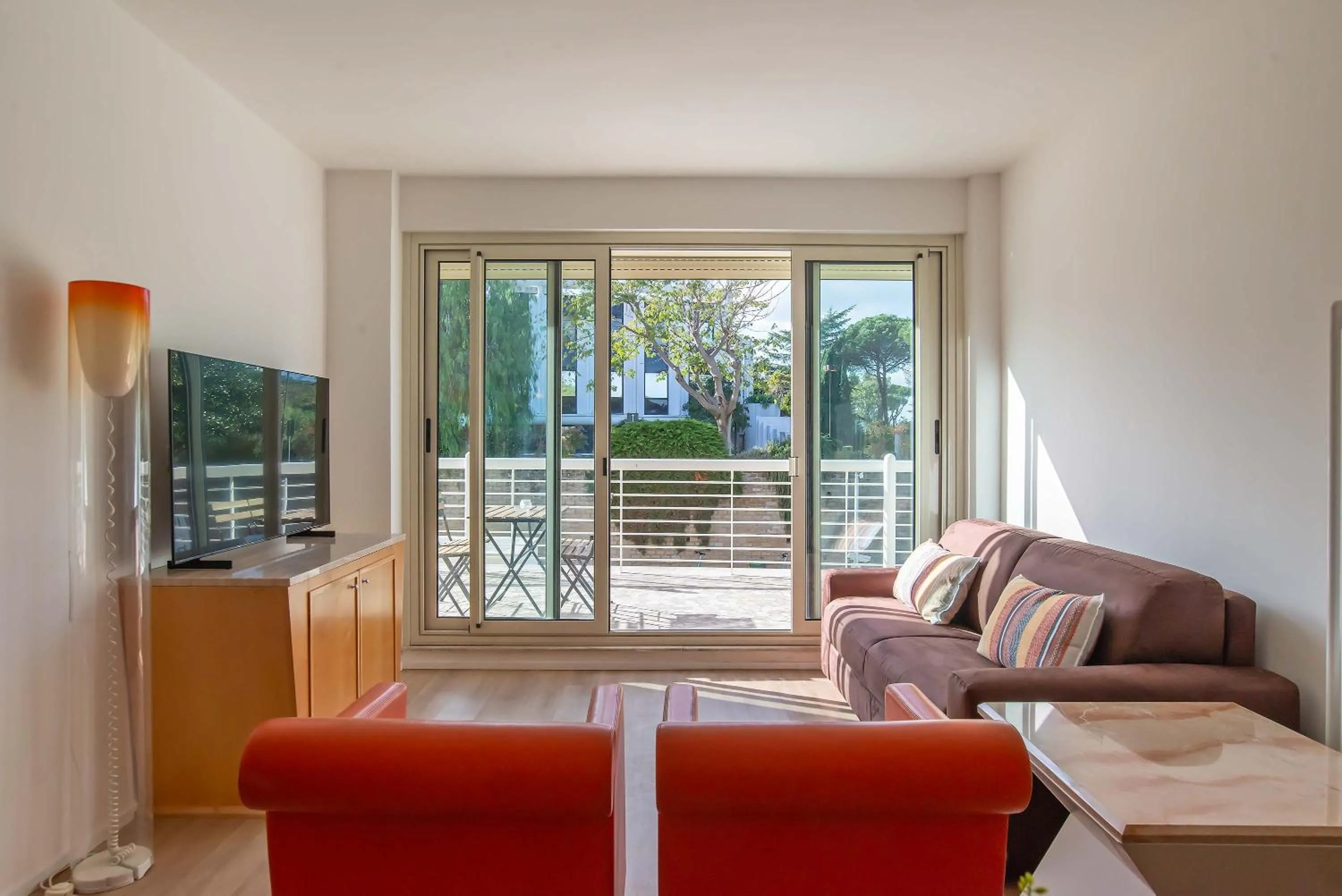 Communal lounge/ TV room in Appartamenti Tre Fontane