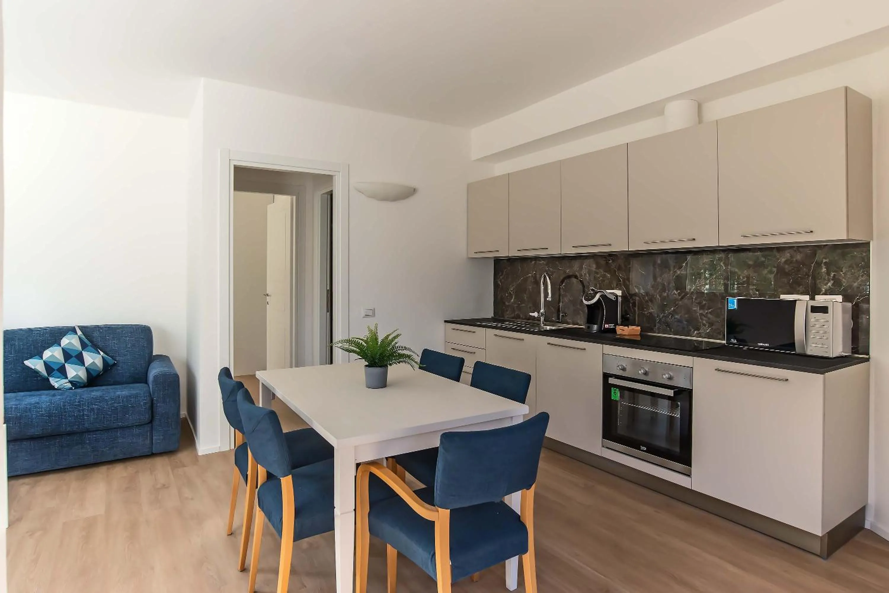 Kitchen or kitchenette in Appartamenti Tre Fontane