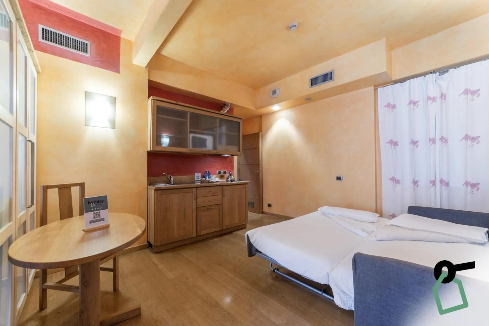 Photo of the whole room in HOTIDAY Discovery - Residence Verona