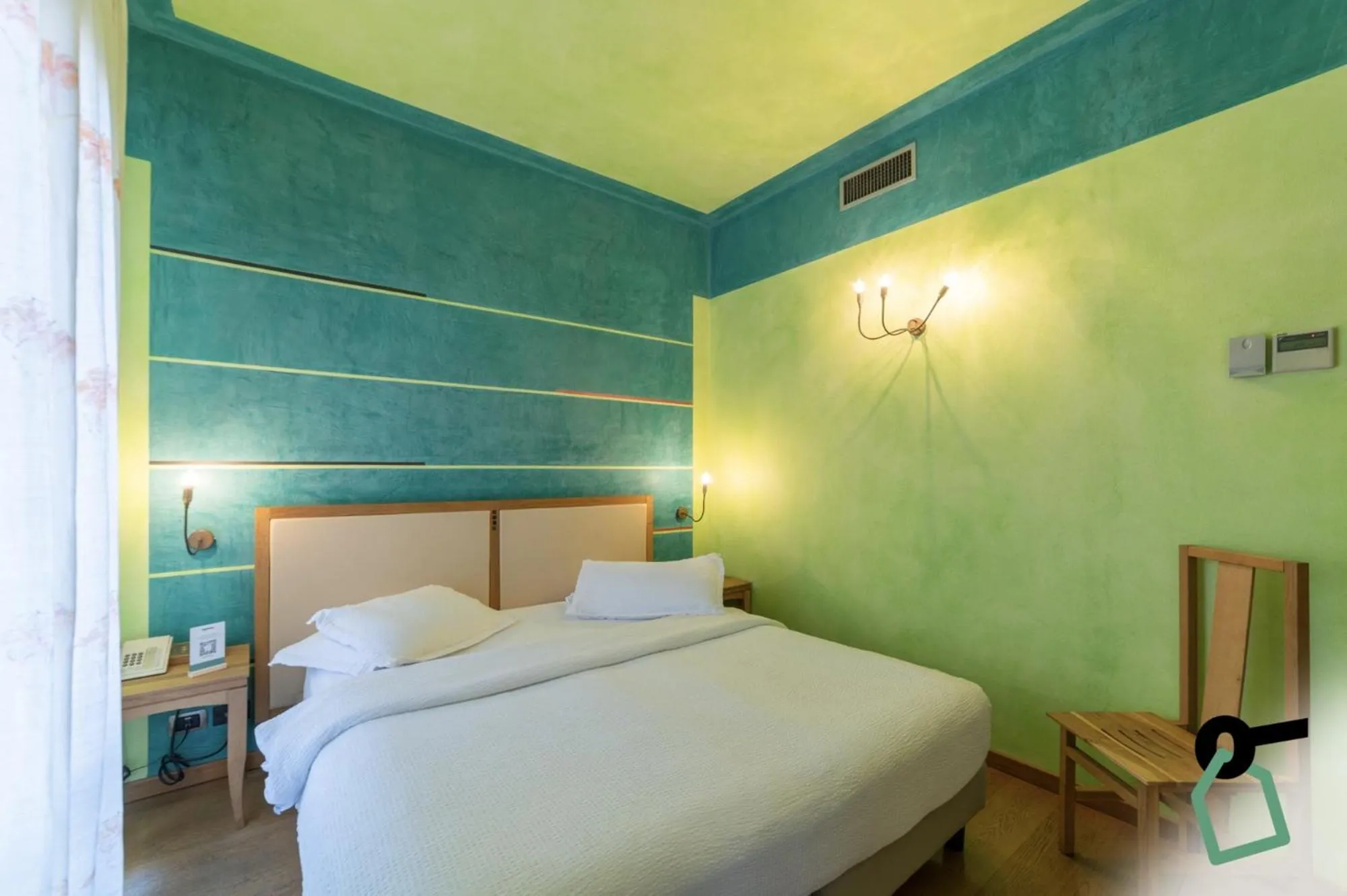 Bed in HOTIDAY Discovery - Residence Verona