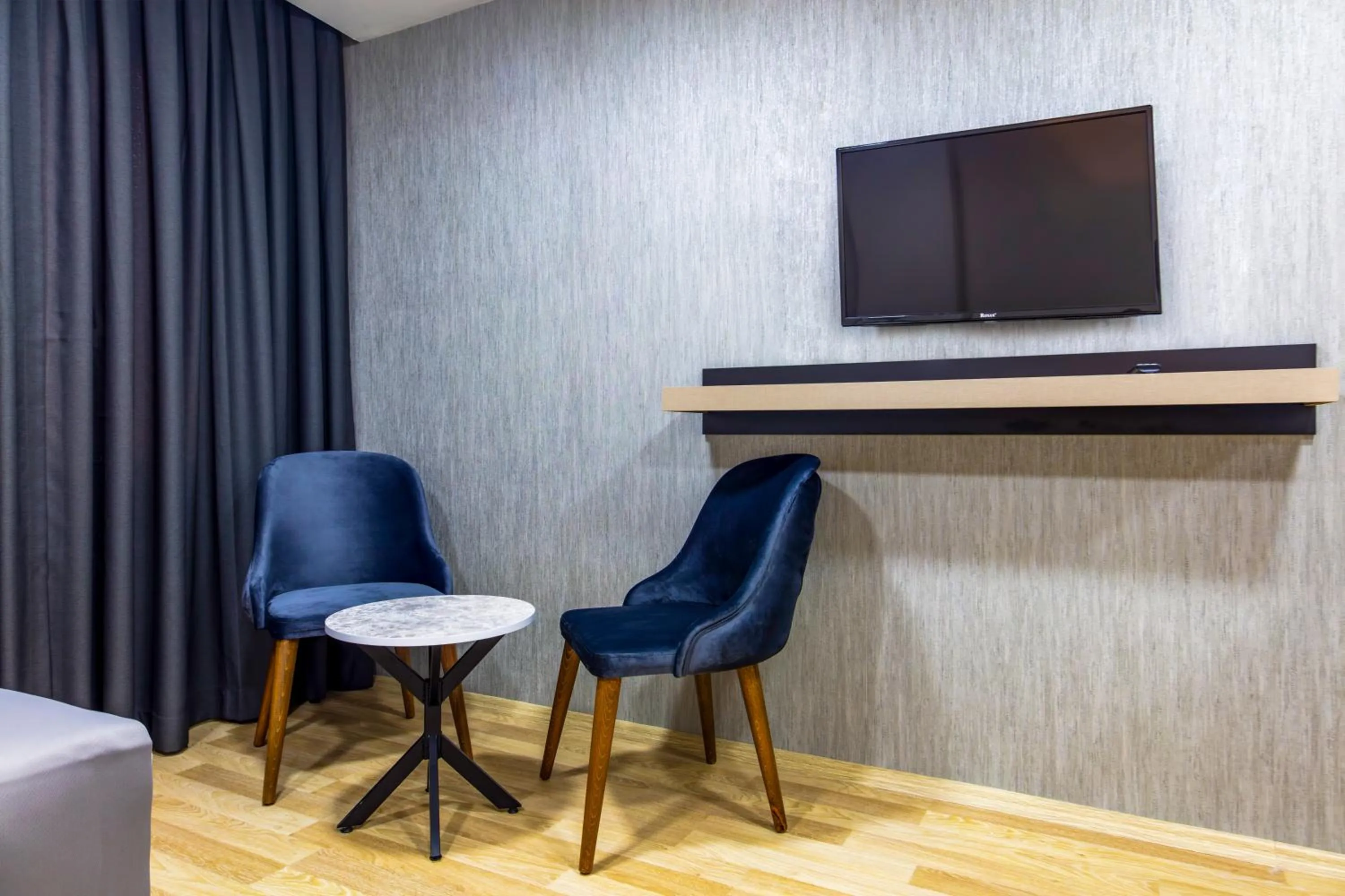 Seating area in The Business Class Hotel