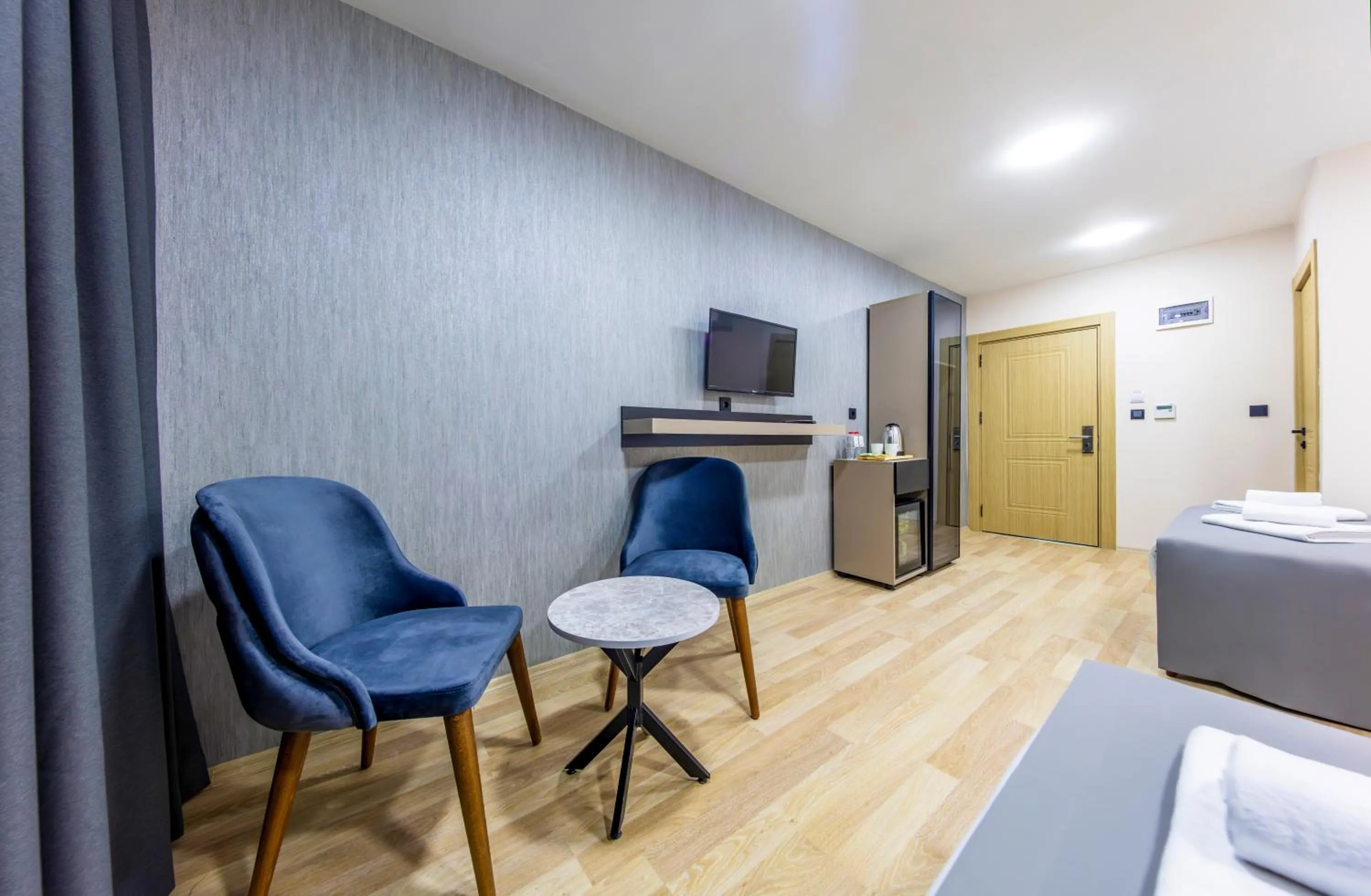 Seating area in The Business Class Hotel