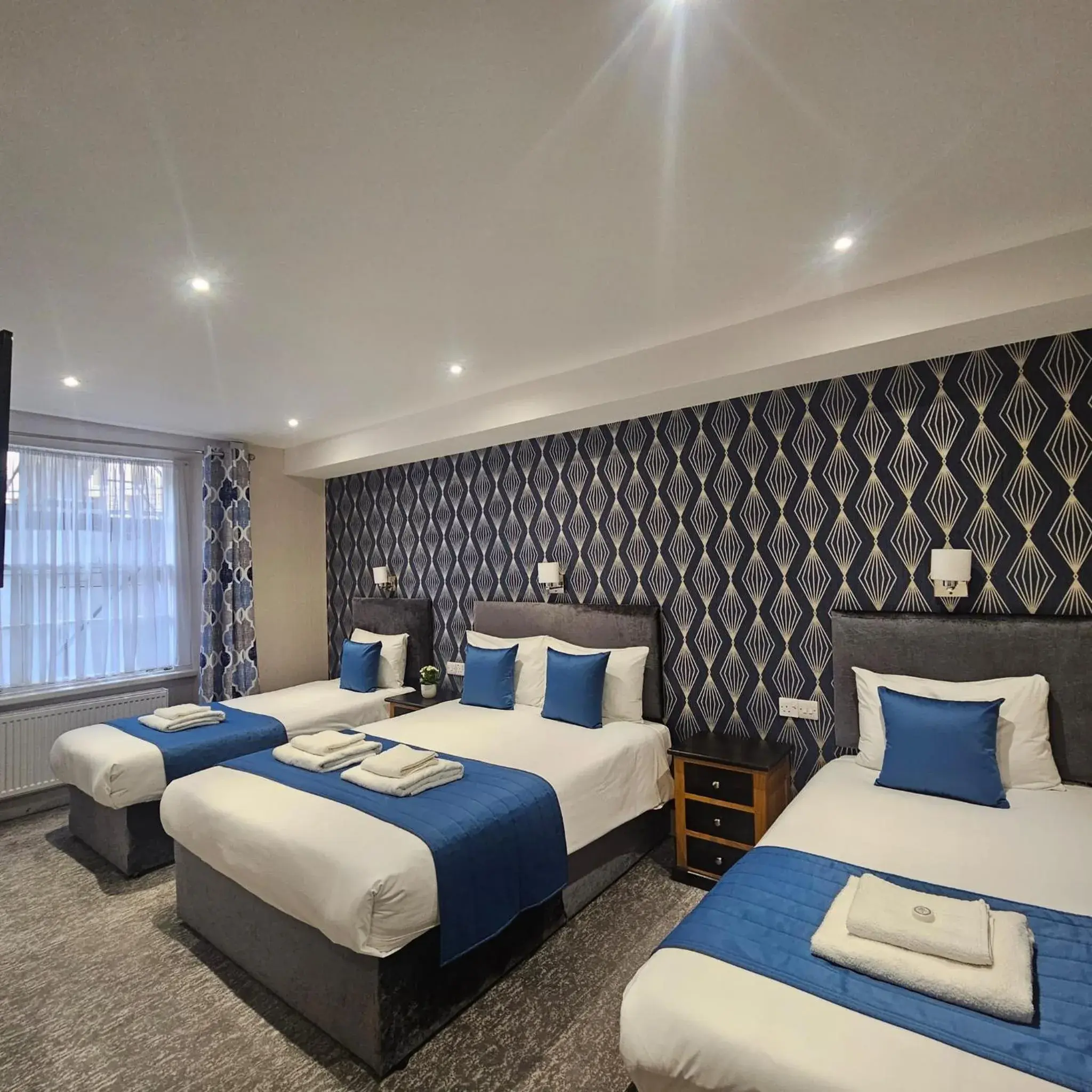 Quadruple Room with Private Bathroom (Lower Ground Floor) in George Hotel Quadruple Room with Private Bathroom (Lower Ground Floor) in George Hotel