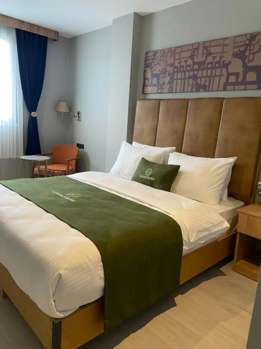 Bed in Gardenmode Airport Hotel