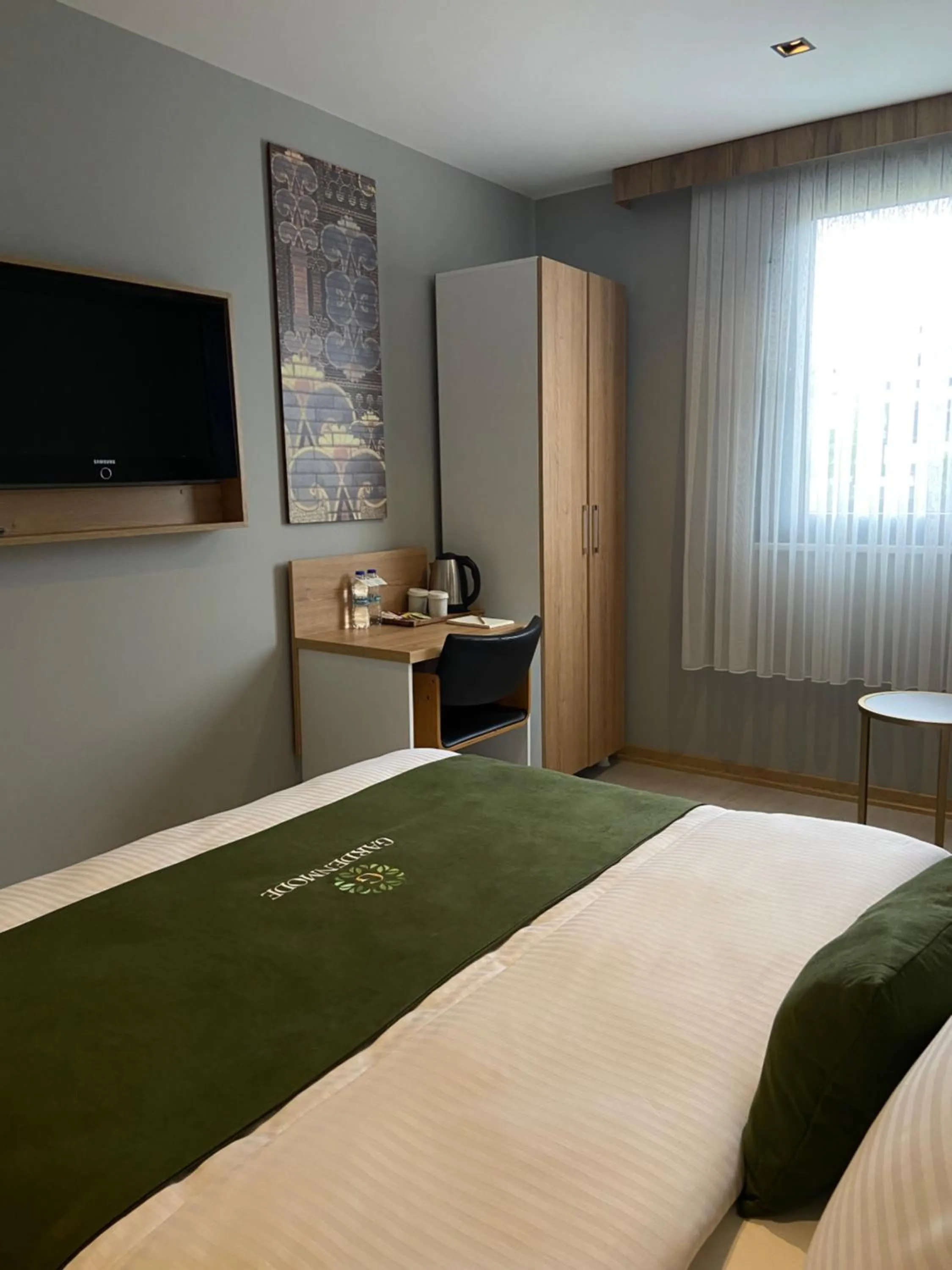 Bed in Gardenmode Airport Hotel