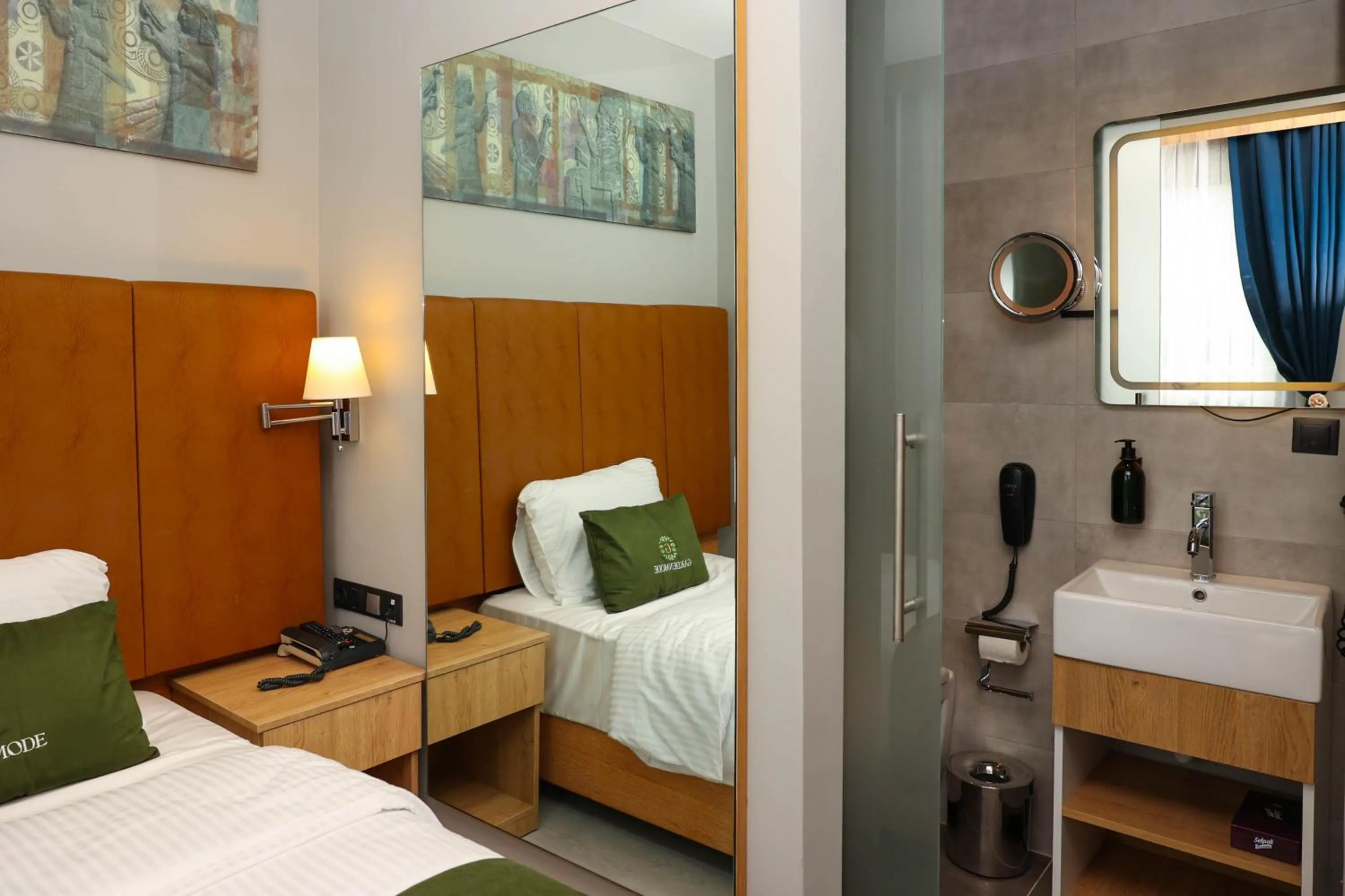 Bed in Gardenmode Airport Hotel