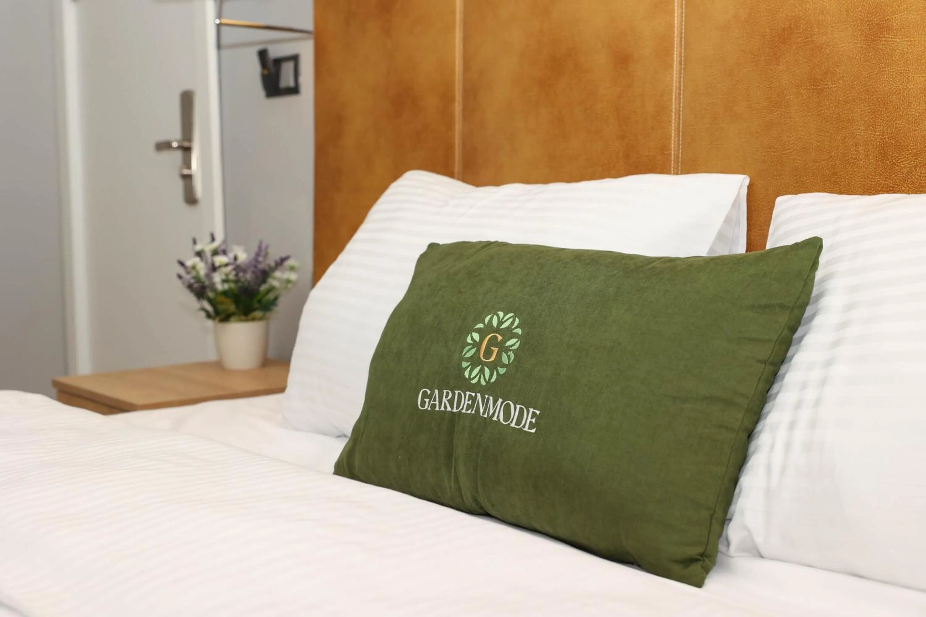 Bed in Gardenmode Airport Hotel