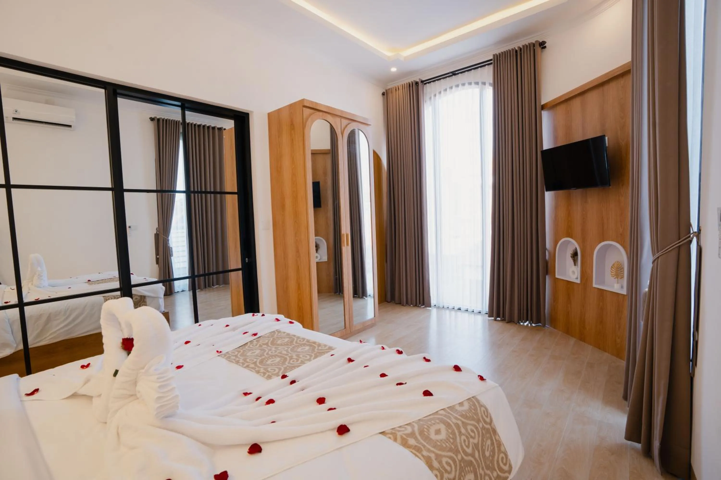 Bed in Melviano Suite & Villa