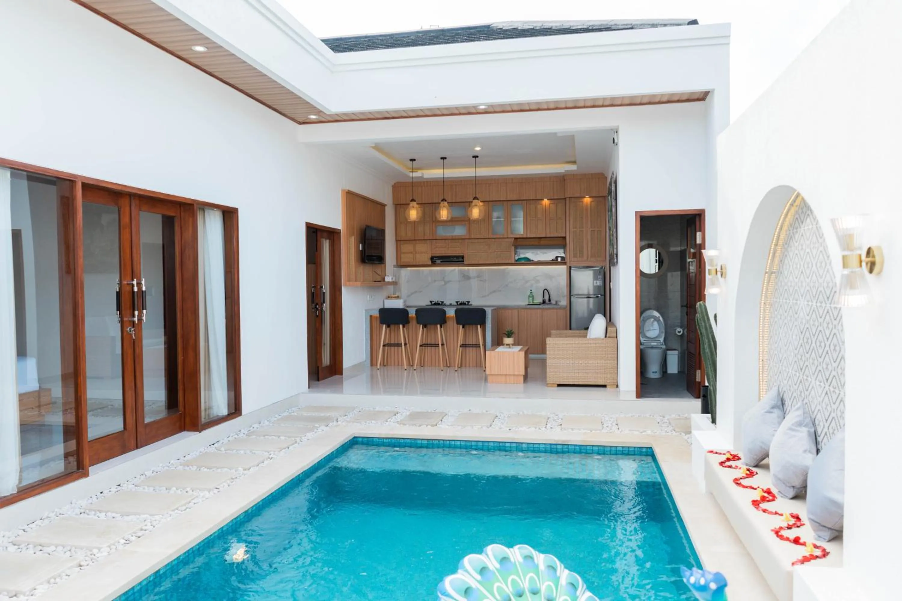 Swimming pool in Melviano Suite & Villa