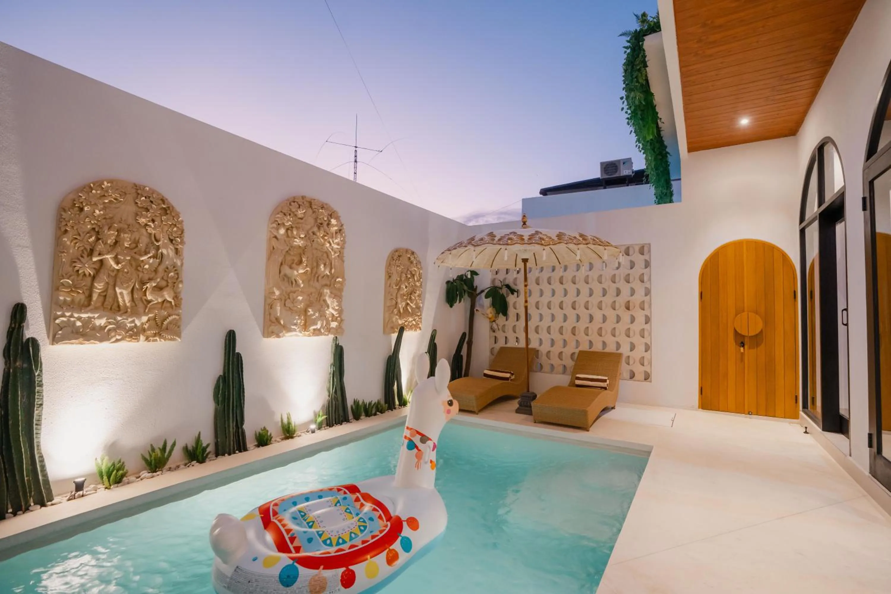 Swimming pool in Melviano Suite & Villa