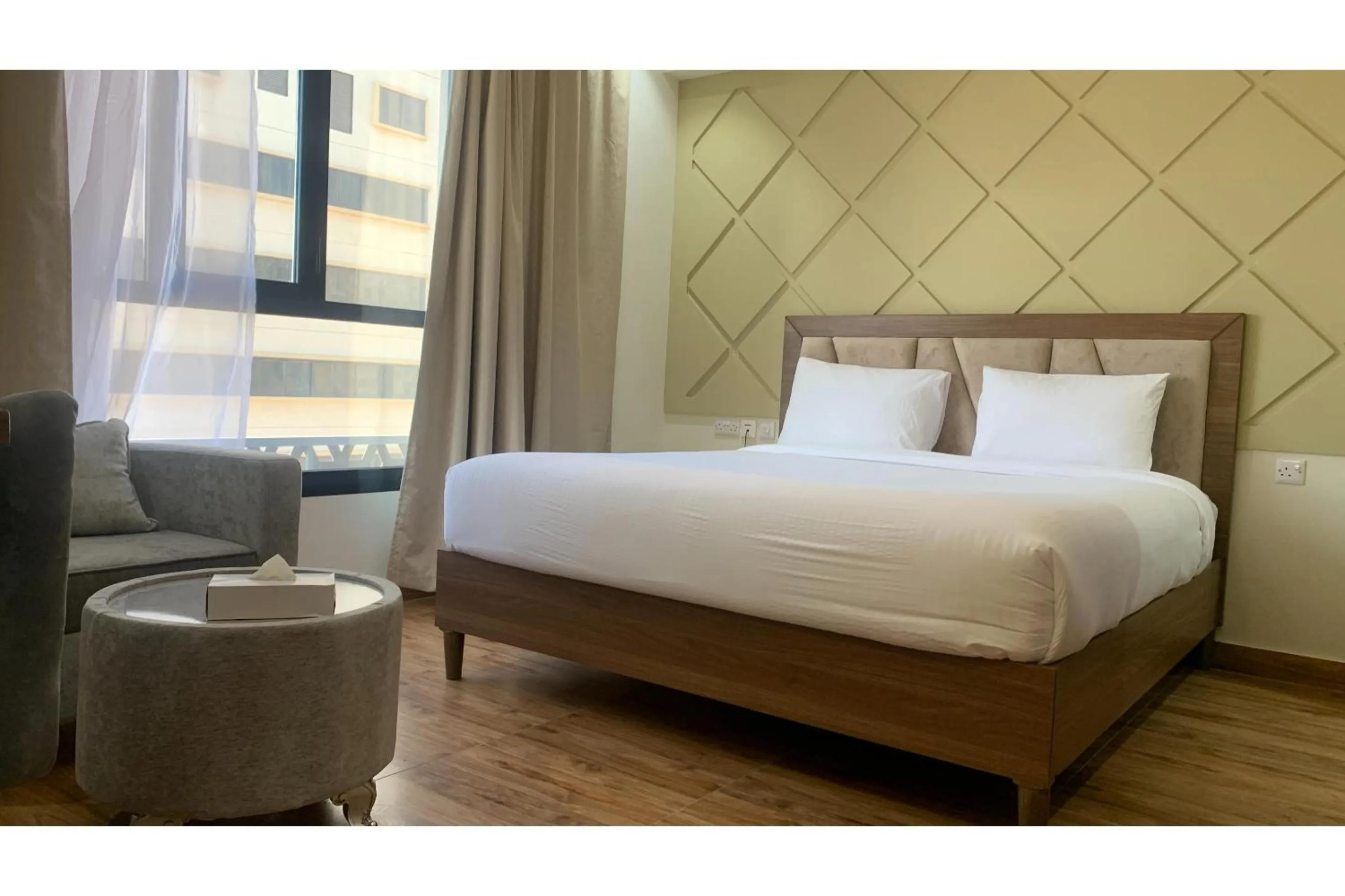 Bedroom, Bed in OYO Townhouse 156 Rose Hotel Apartments