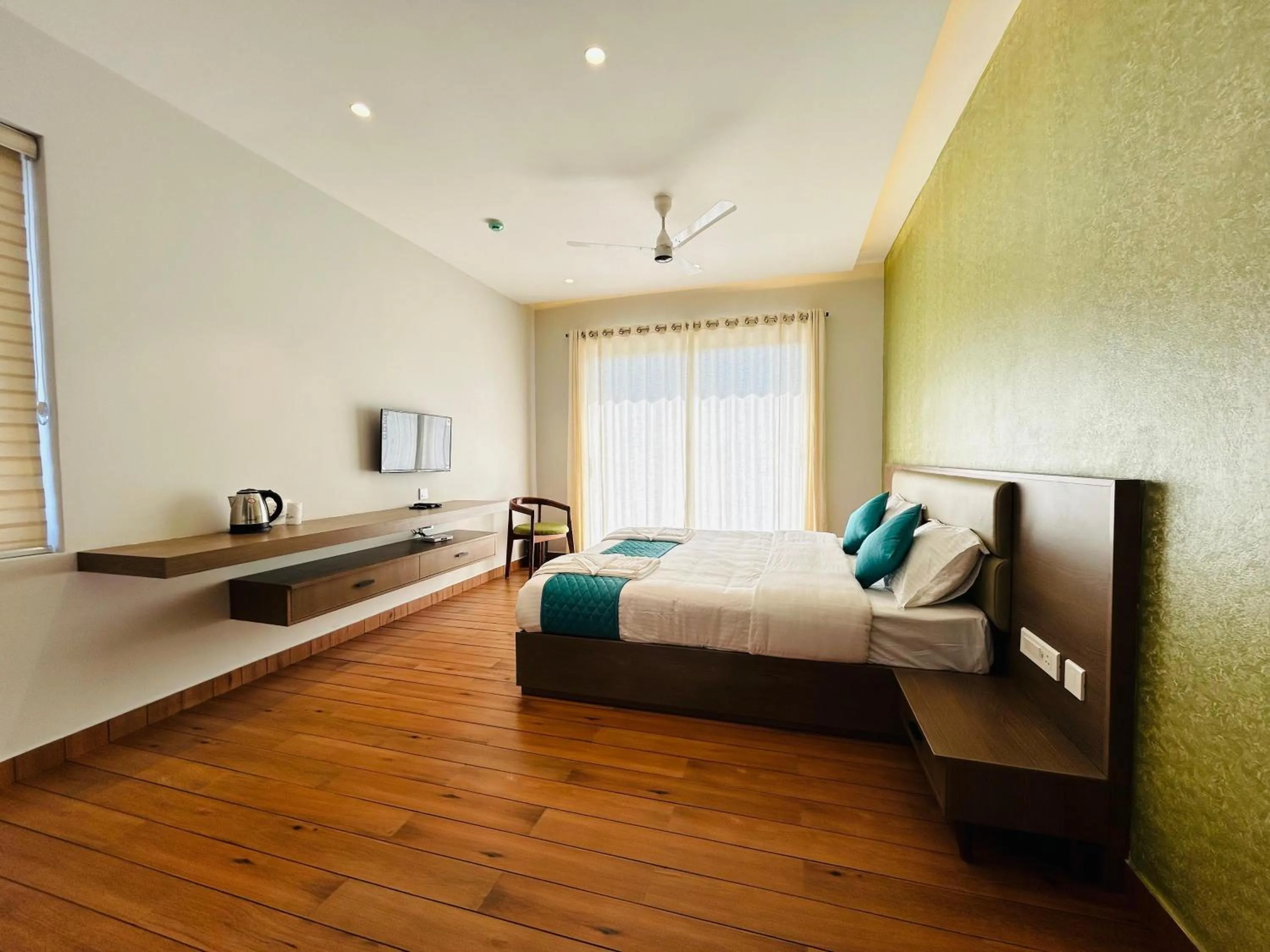 Bed in VAGA NAKSHATHRA SUITES