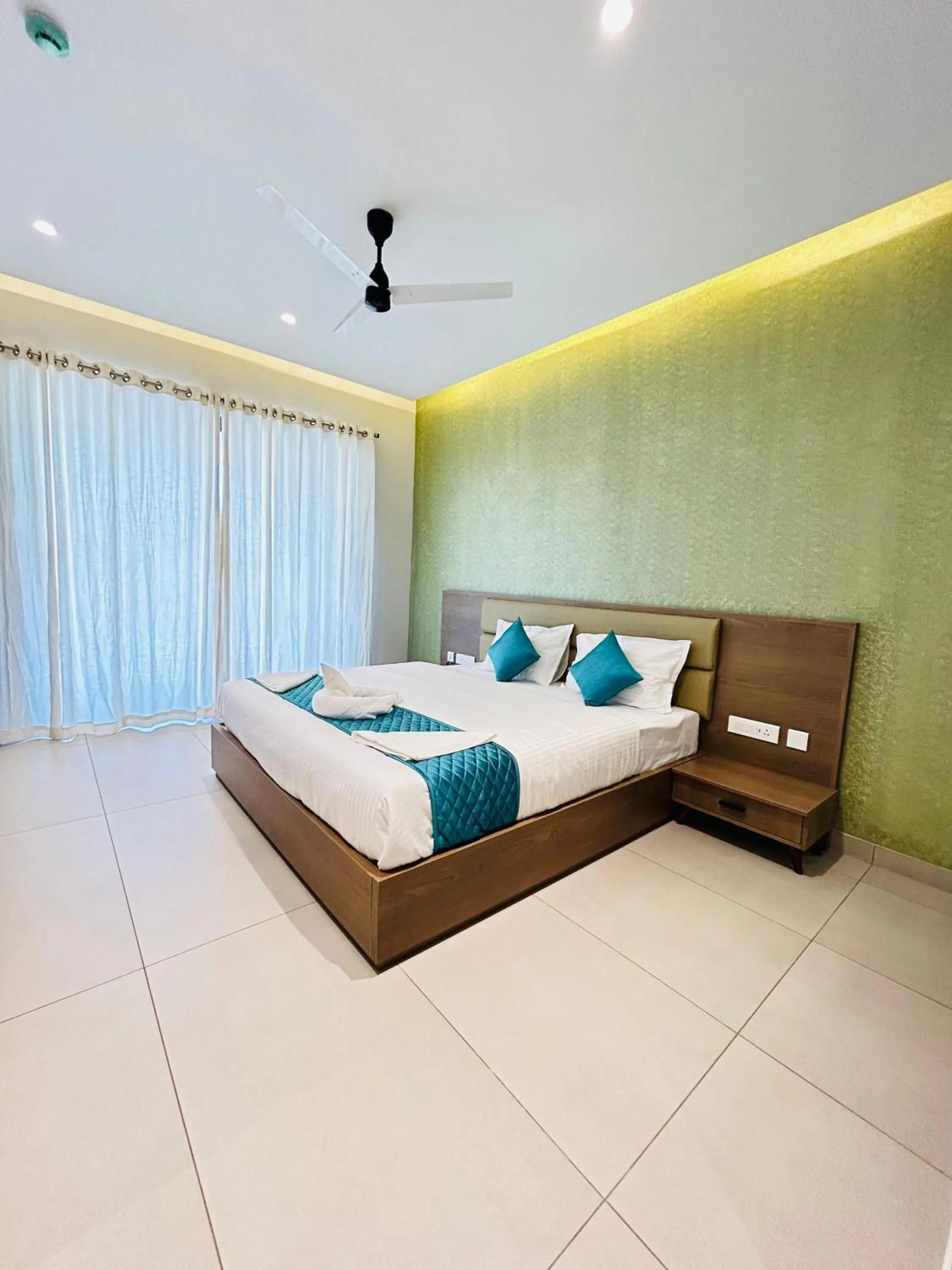 Bed in VAGA NAKSHATHRA SUITES