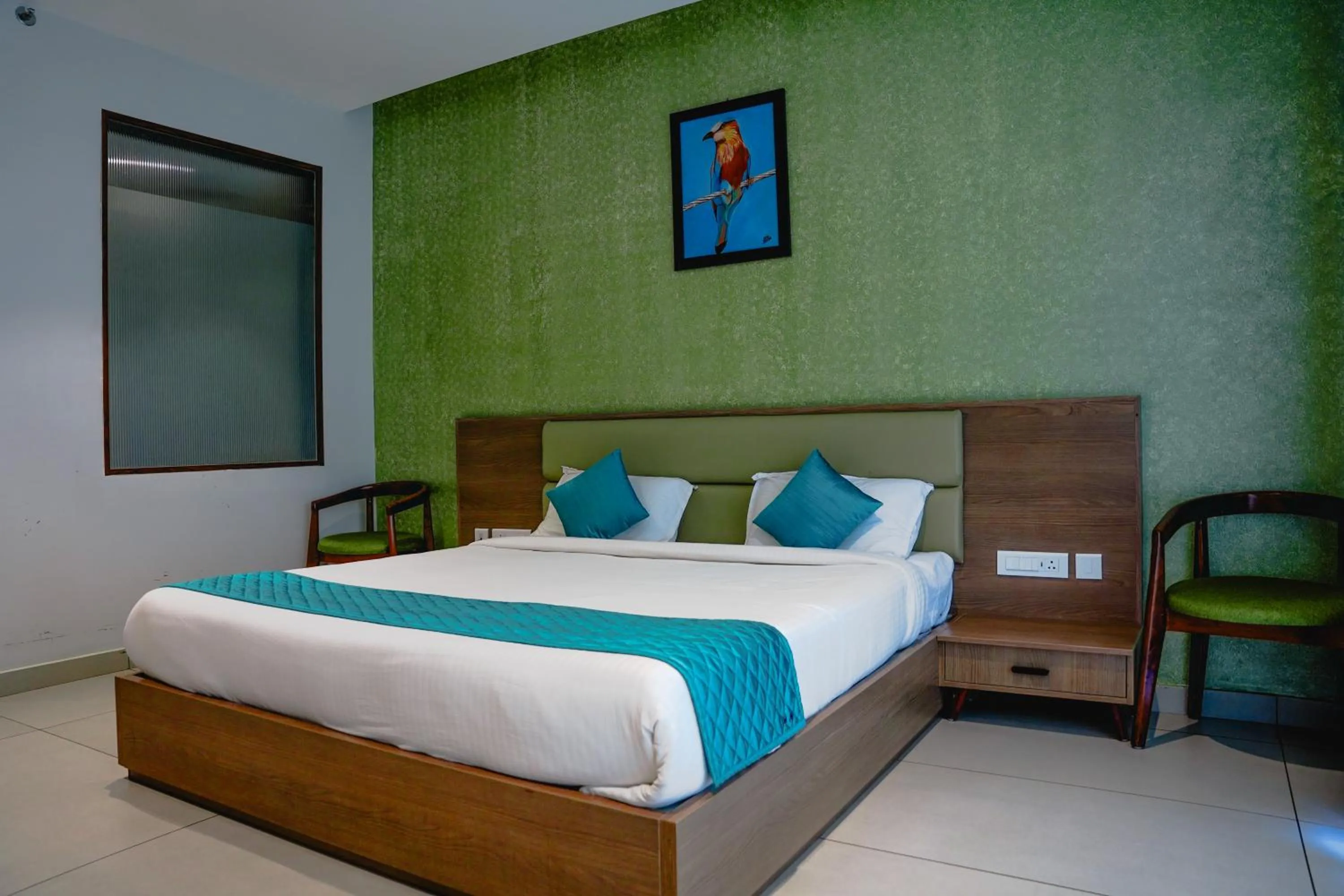 Bed in VAGA NAKSHATHRA SUITES