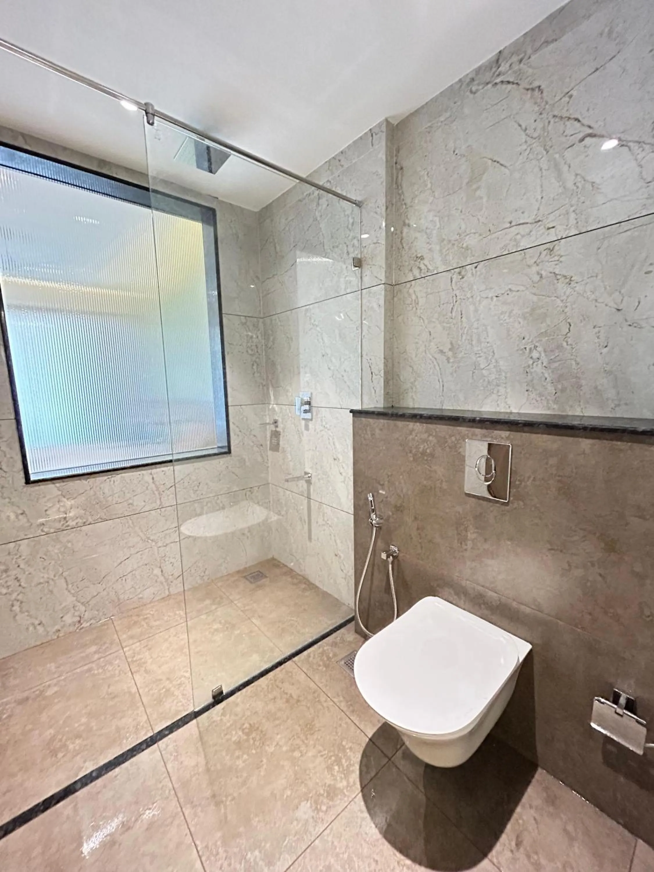 Shower in VAGA NAKSHATHRA SUITES