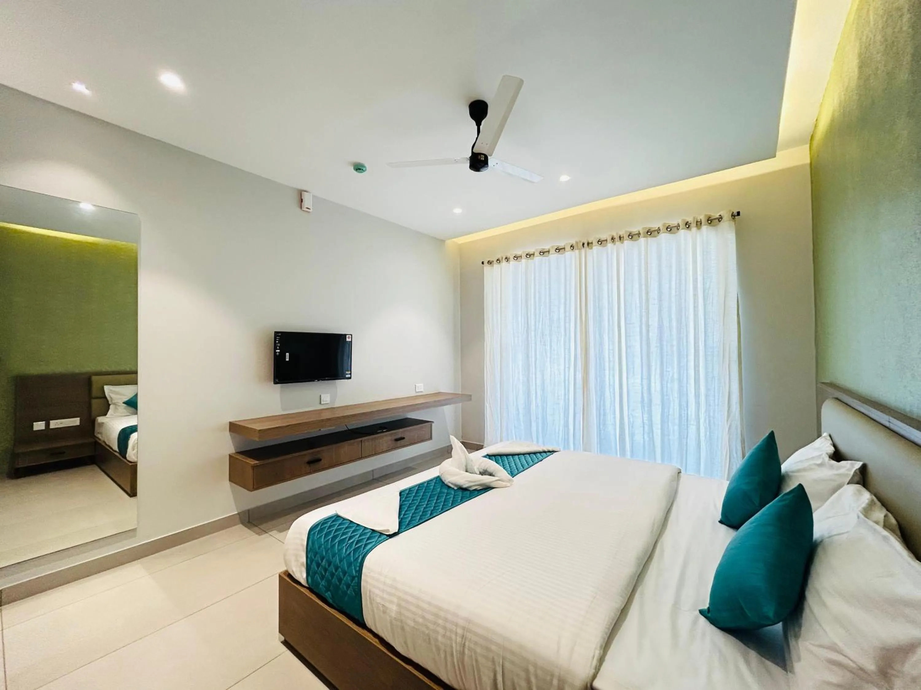 Bed in VAGA NAKSHATHRA SUITES