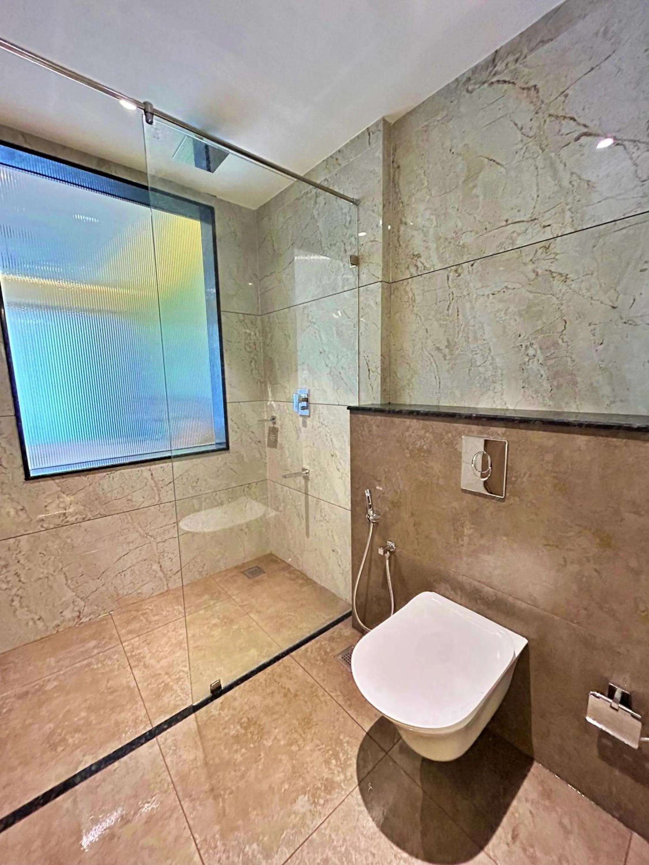 Shower in VAGA NAKSHATHRA SUITES