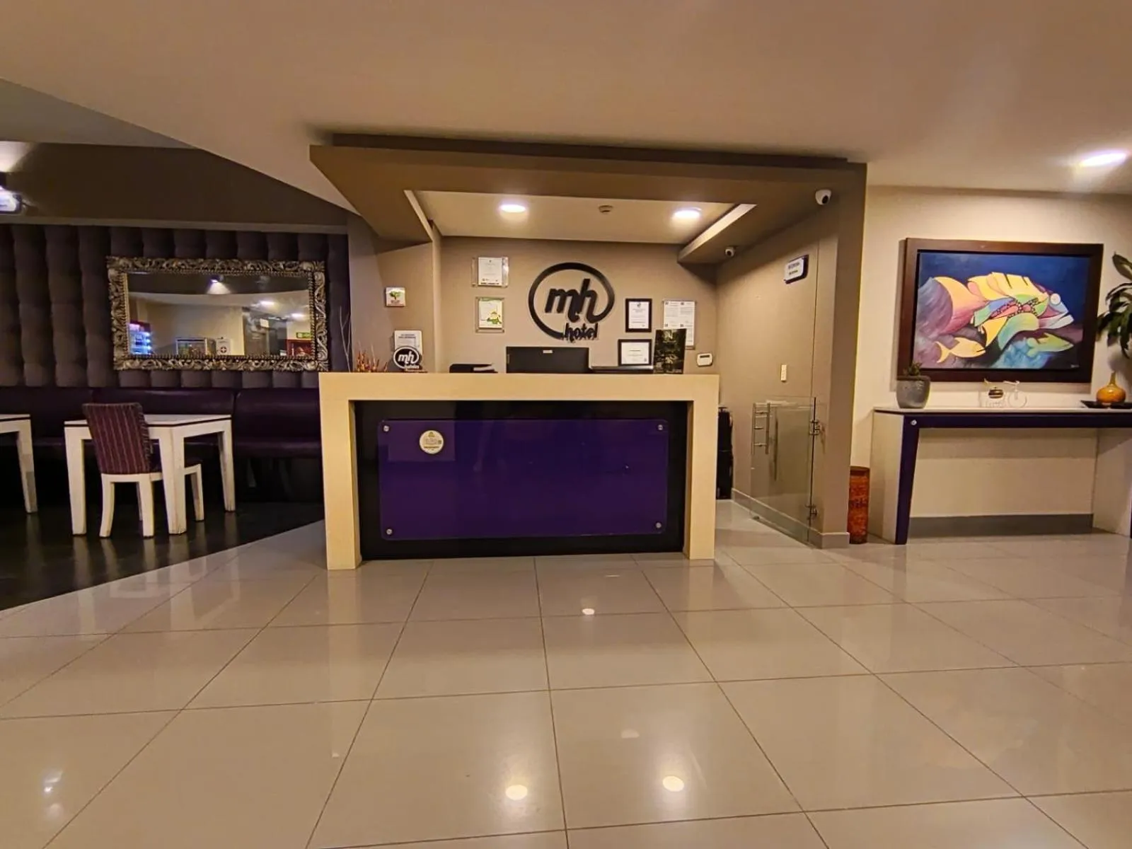 Property logo or sign in Hotel MH Pereira