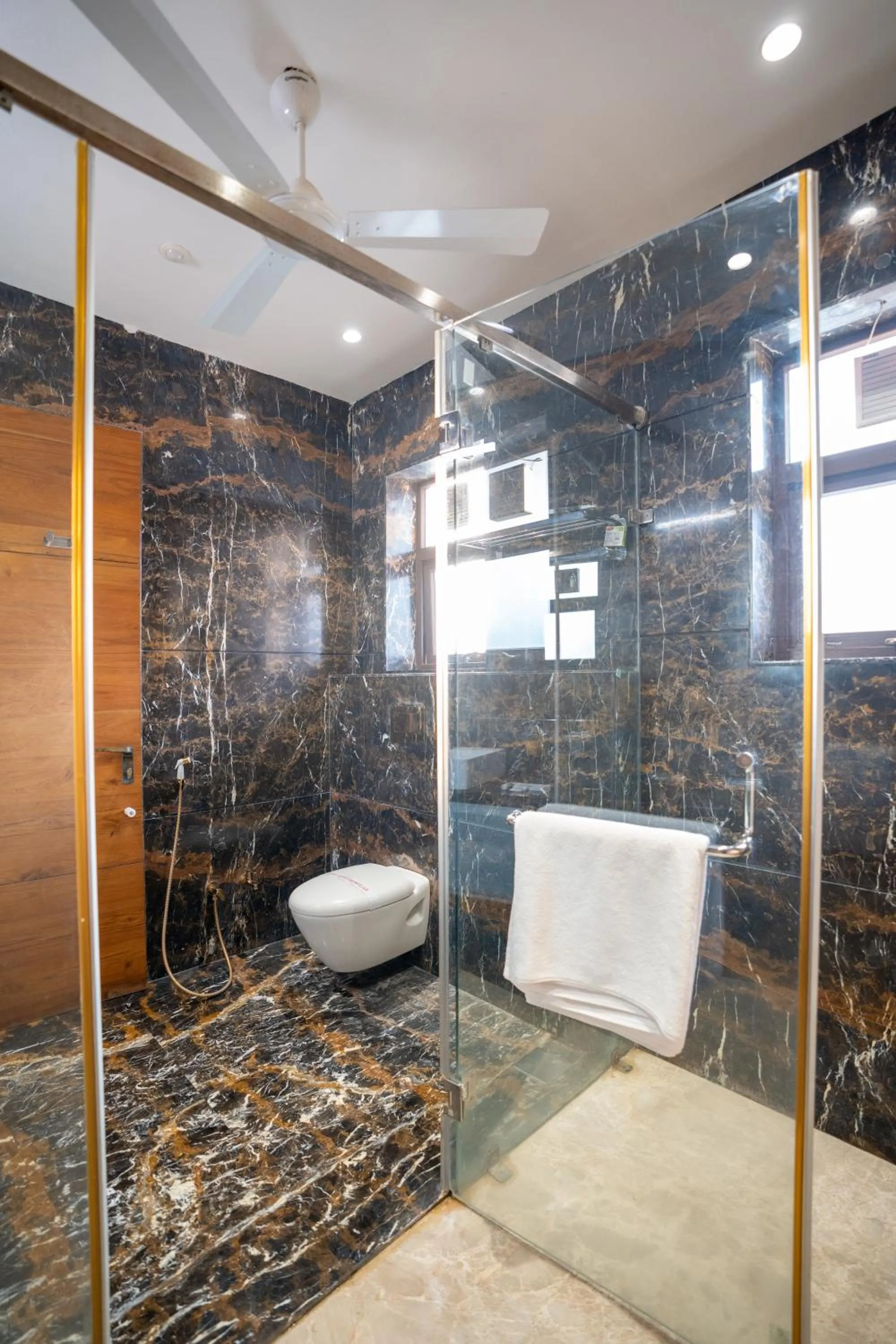 Shower in The Gaj Kesri Gir - Best Wildlife Resort in Gir