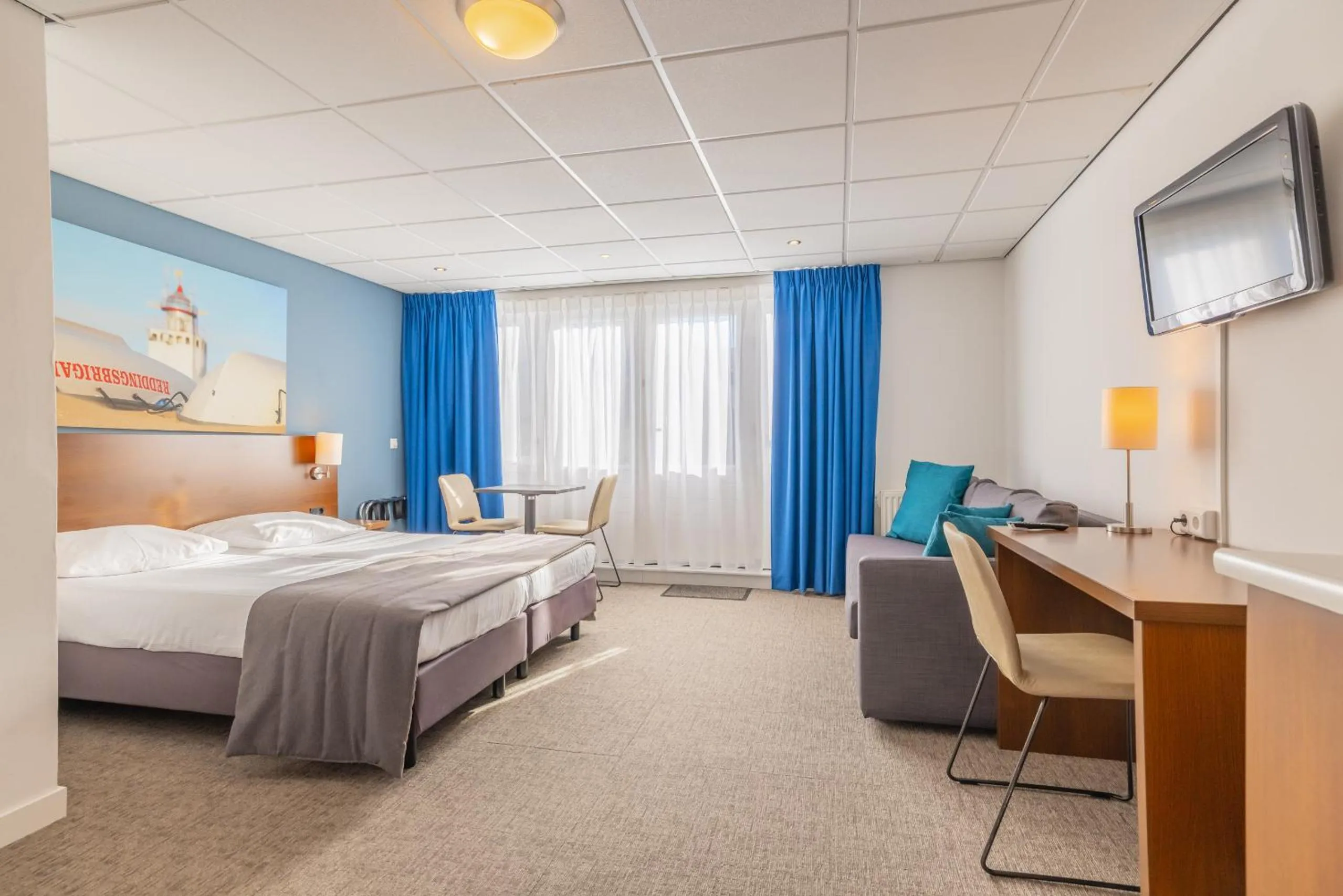 Seating area, Bed in Hotel De Koningshof