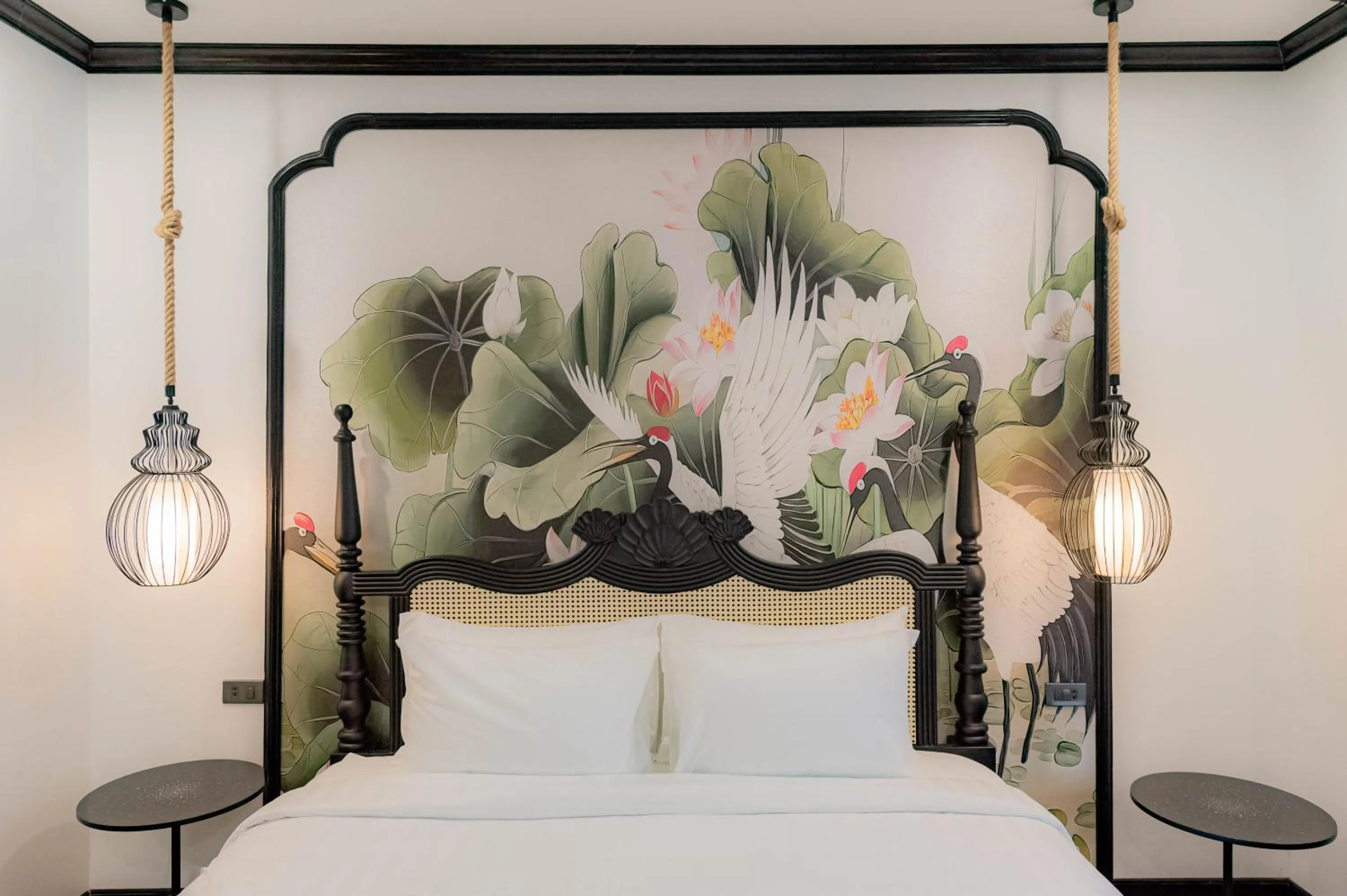 Decorative detail, Bed in Cozy An Boutique Hotel Luangprabang