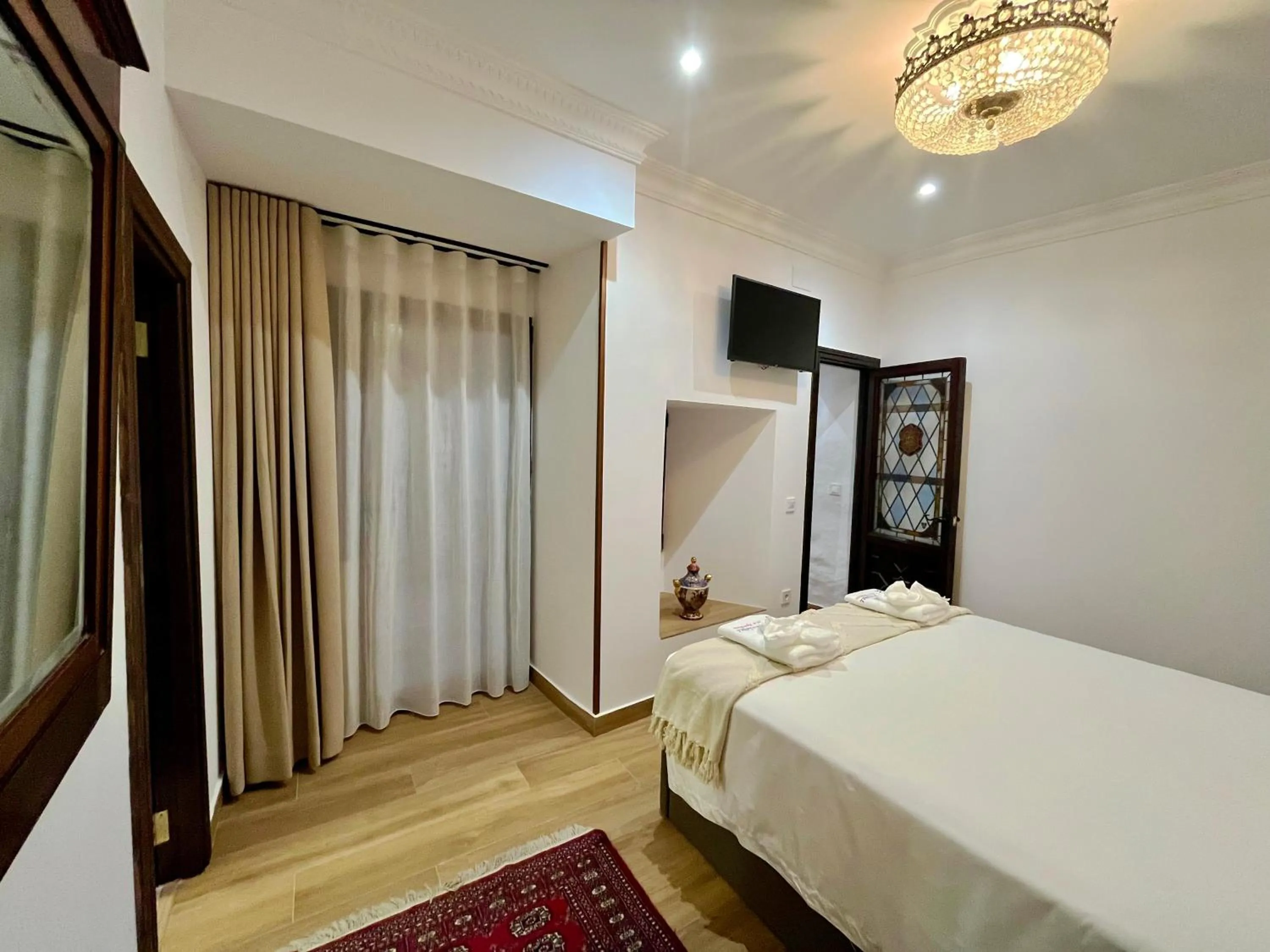 Bed in Casón De Los López Apartments