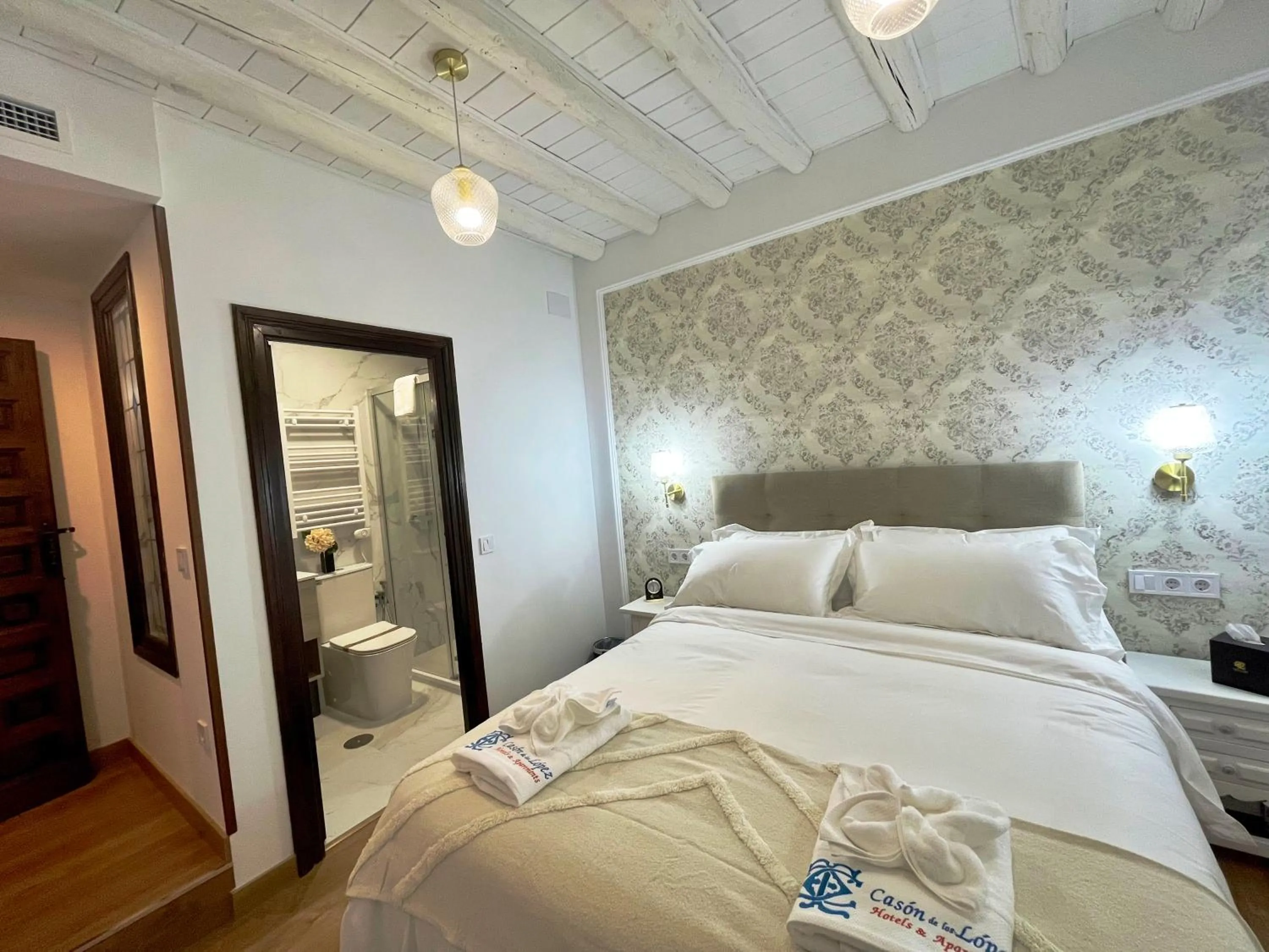 Bed in Casón De Los López Apartments