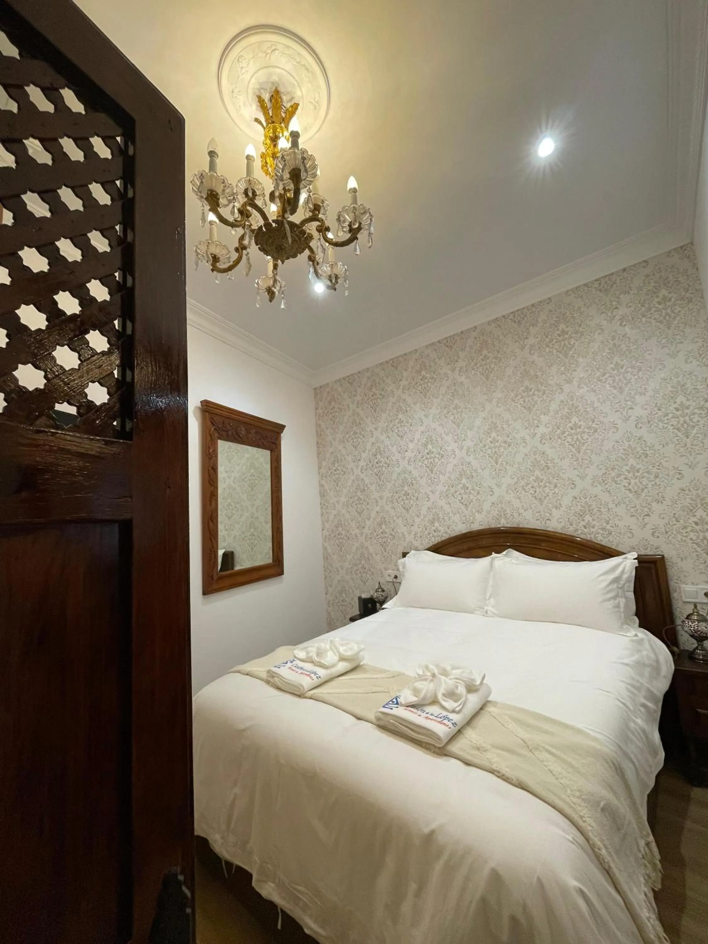 Bed in Casón De Los López Apartments