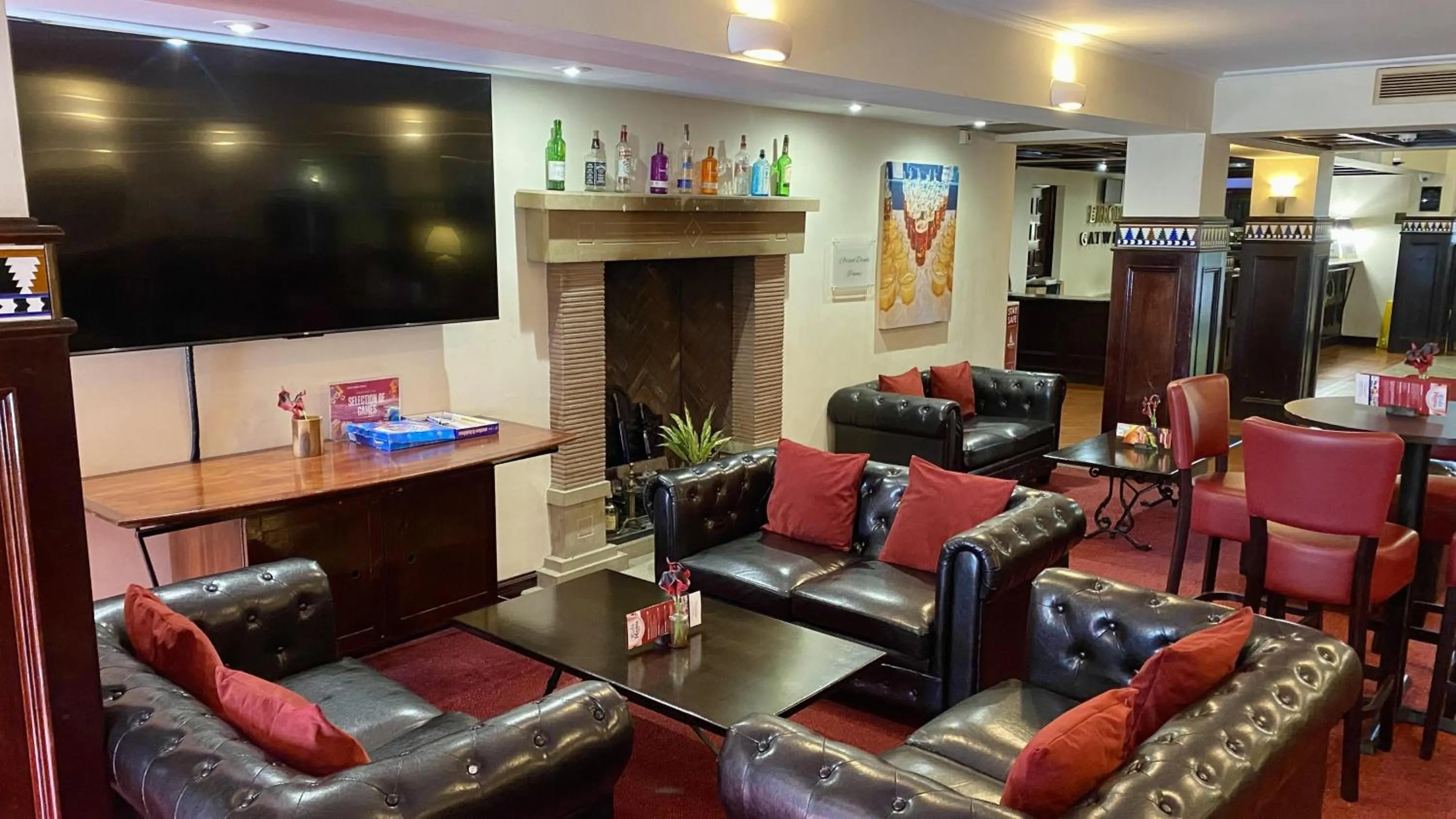 Communal lounge/ TV room in Europa Gatwick Hotel